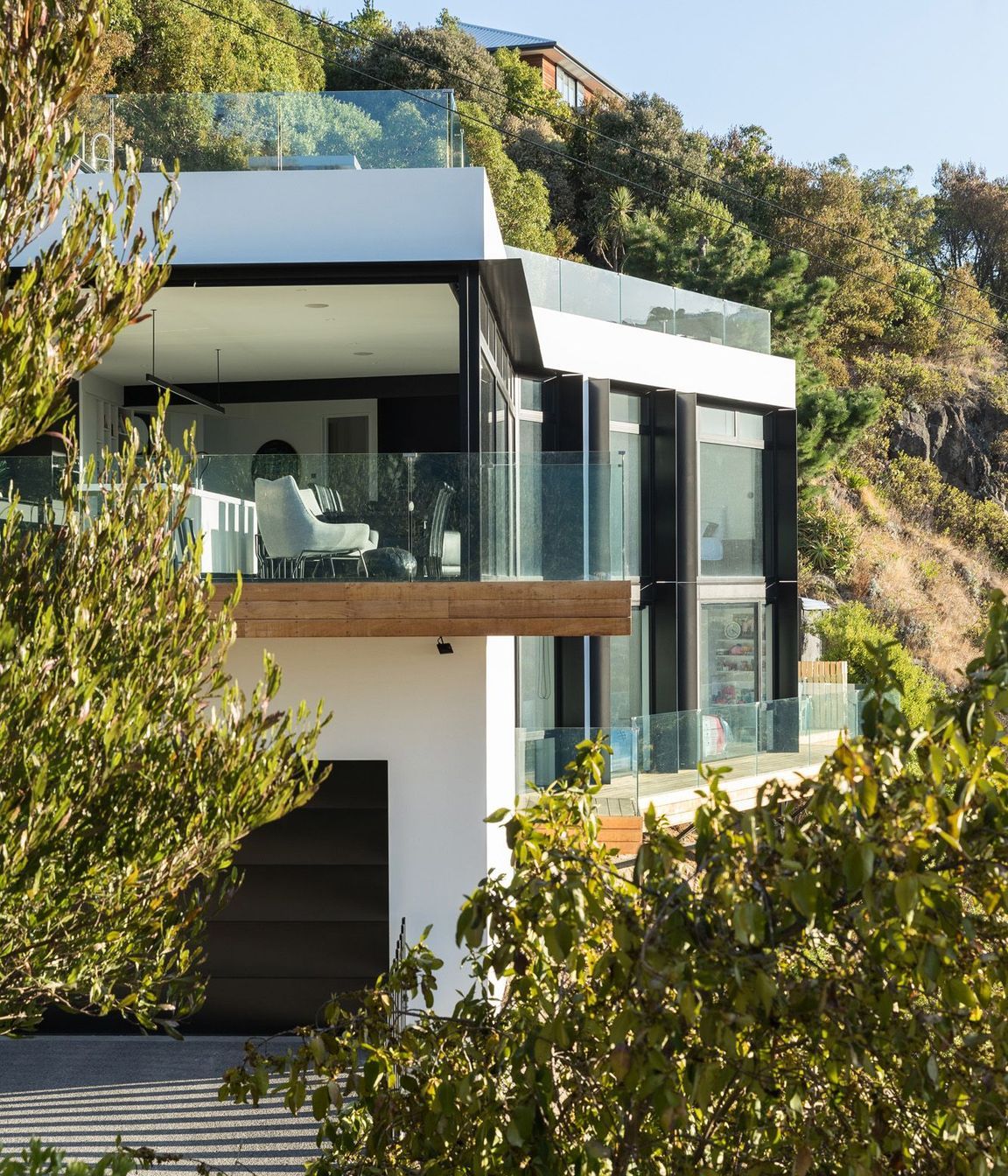 The northern elevation shows the terrace leading into the living/dining area on the first floor.