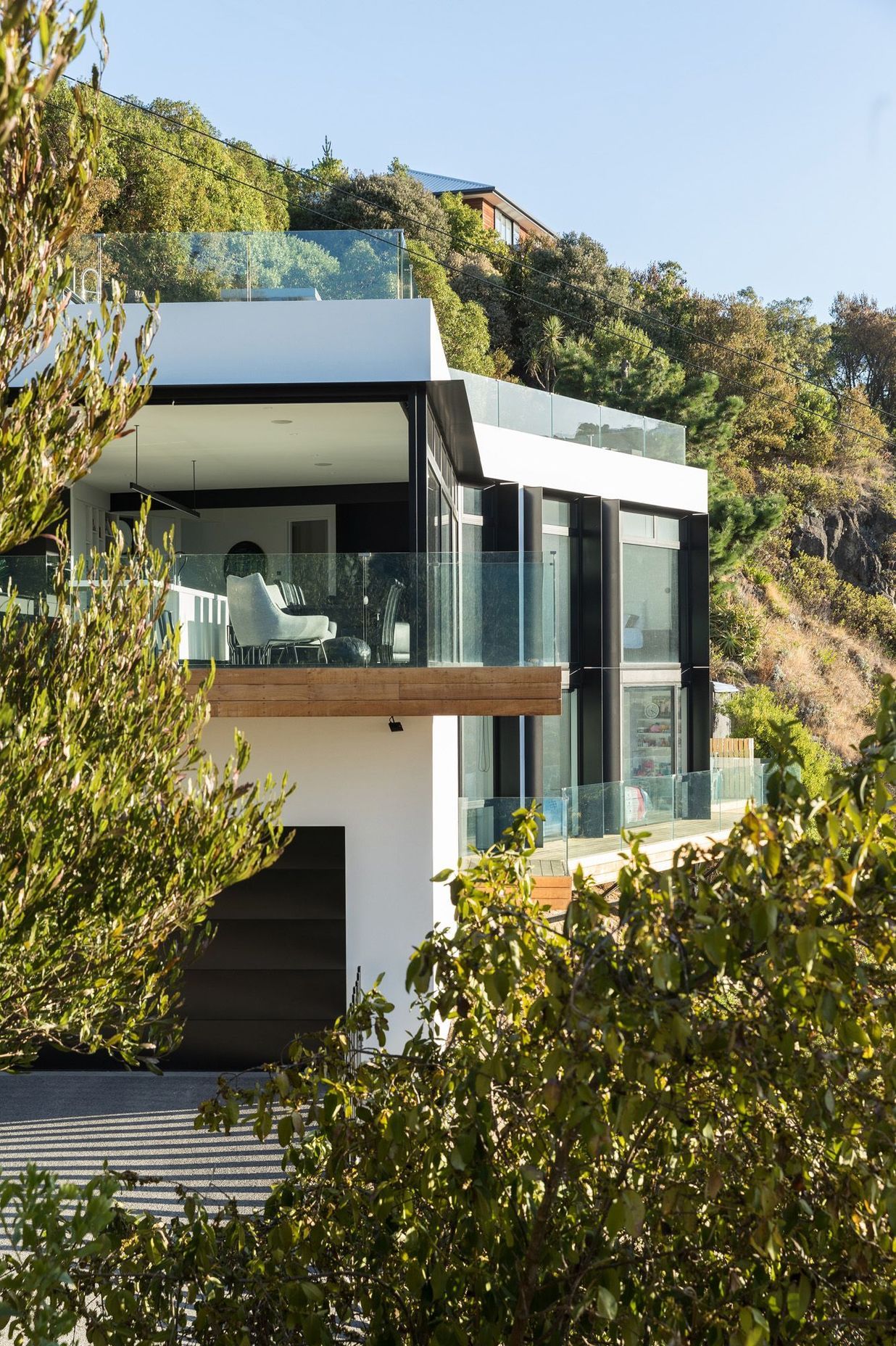 The northern elevation shows the terrace leading into the living/dining area on the first floor.