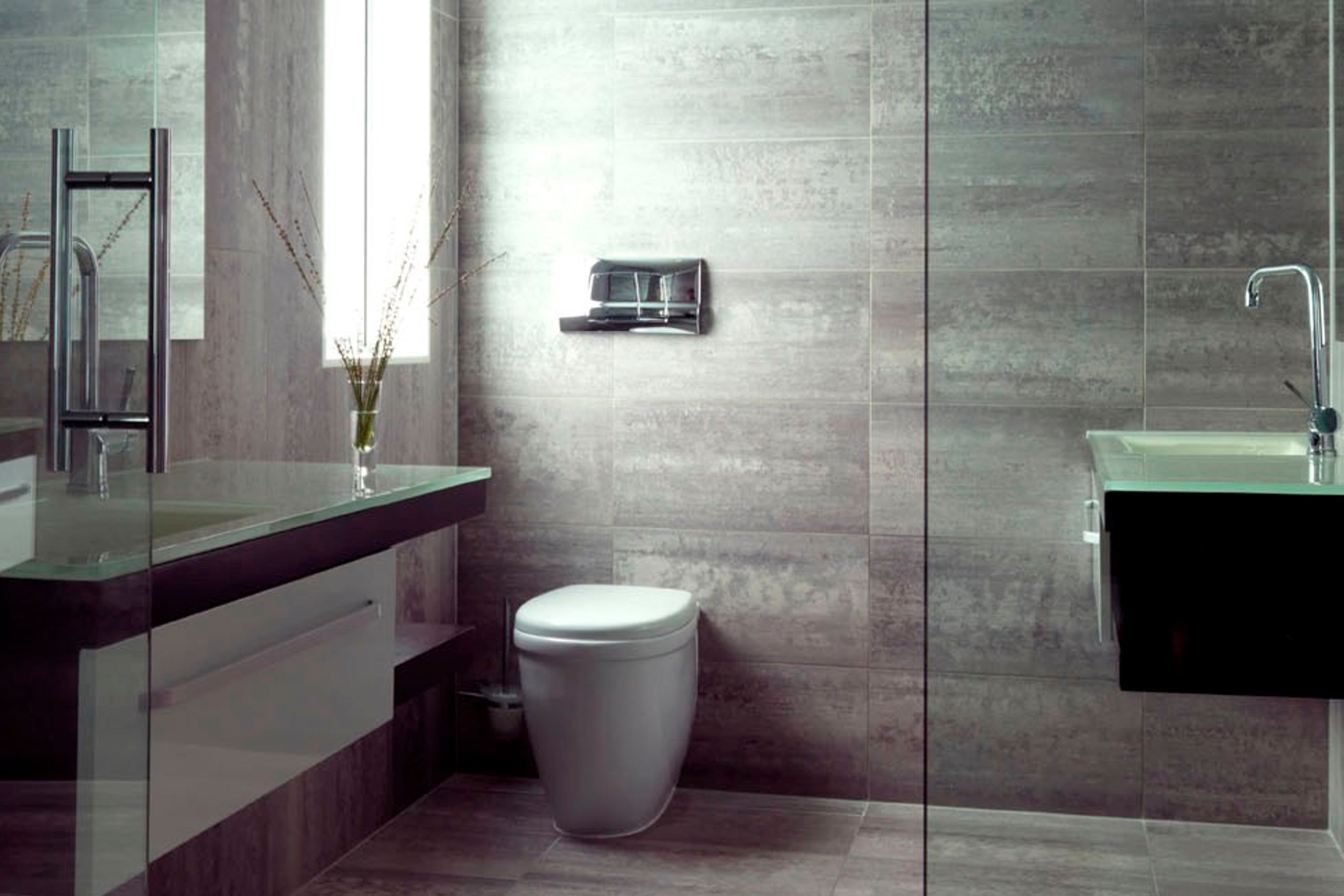 The challenge was to fit two bathroom vanities (one for each person), a WC, shower and bath inside a 2.00 x 5.00 m space.