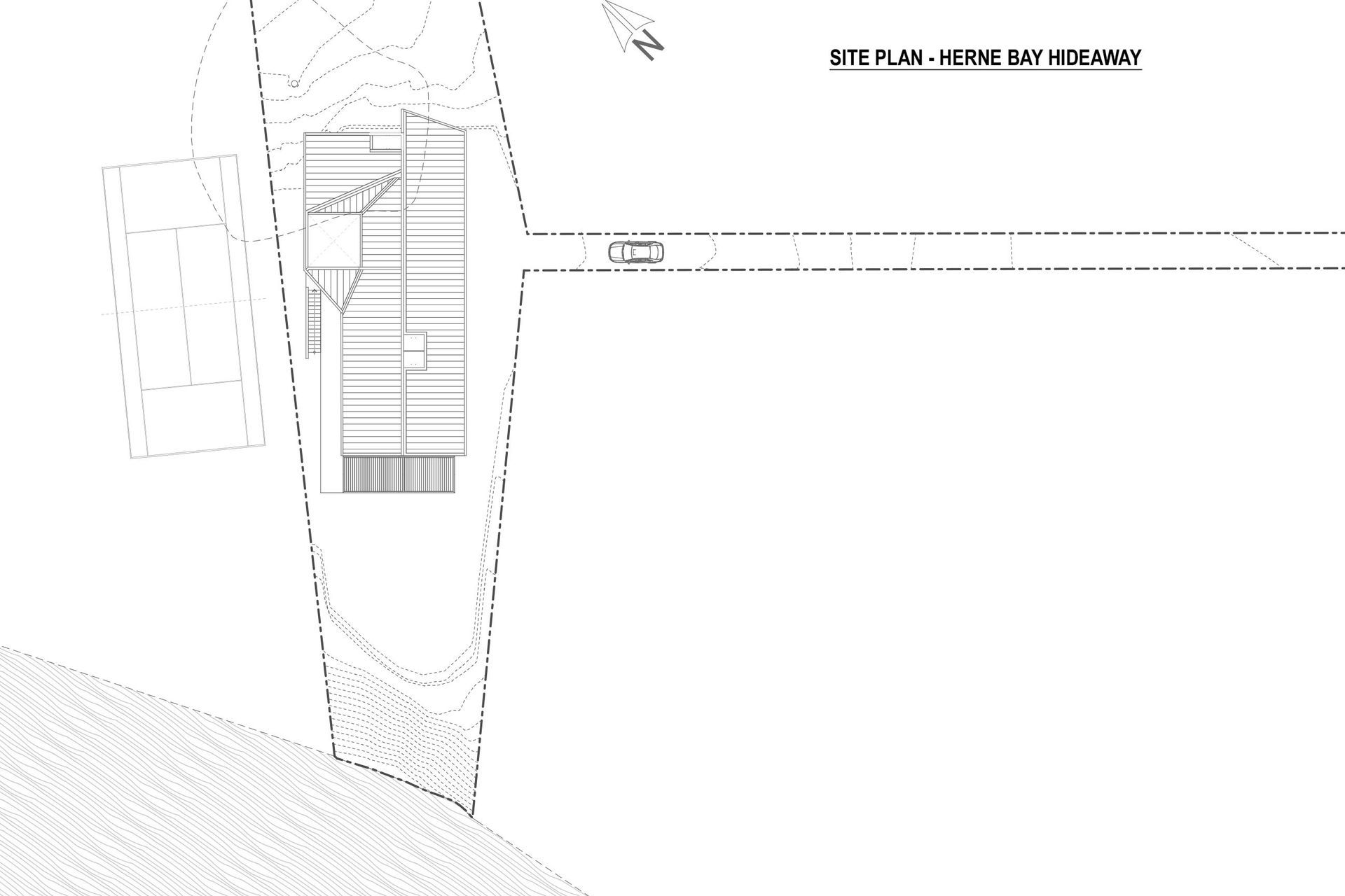 Site plan by Lloyd Hartley Architects indicates the tennis court on the left and the 75m-long driveway on the right.