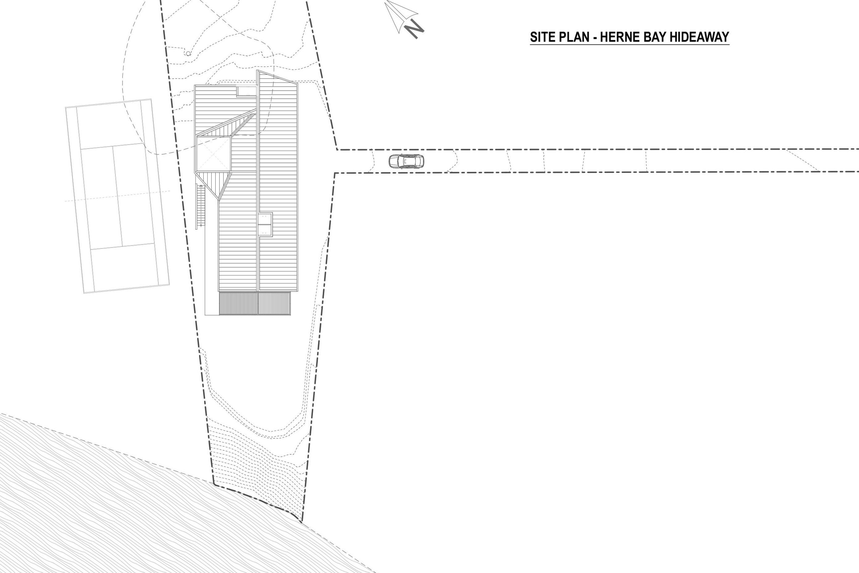 Site plan by Lloyd Hartley Architects indicates the tennis court on the left and the 75m-long driveway on the right.