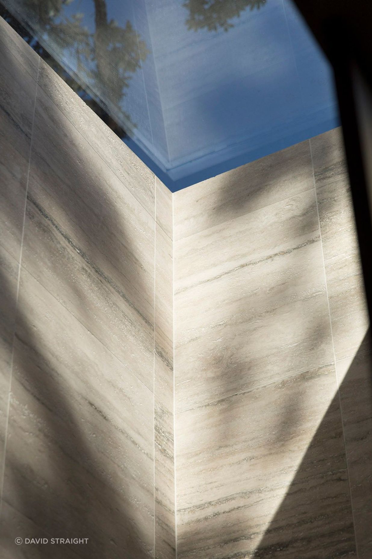 Looking up to the sky through the lightwell.