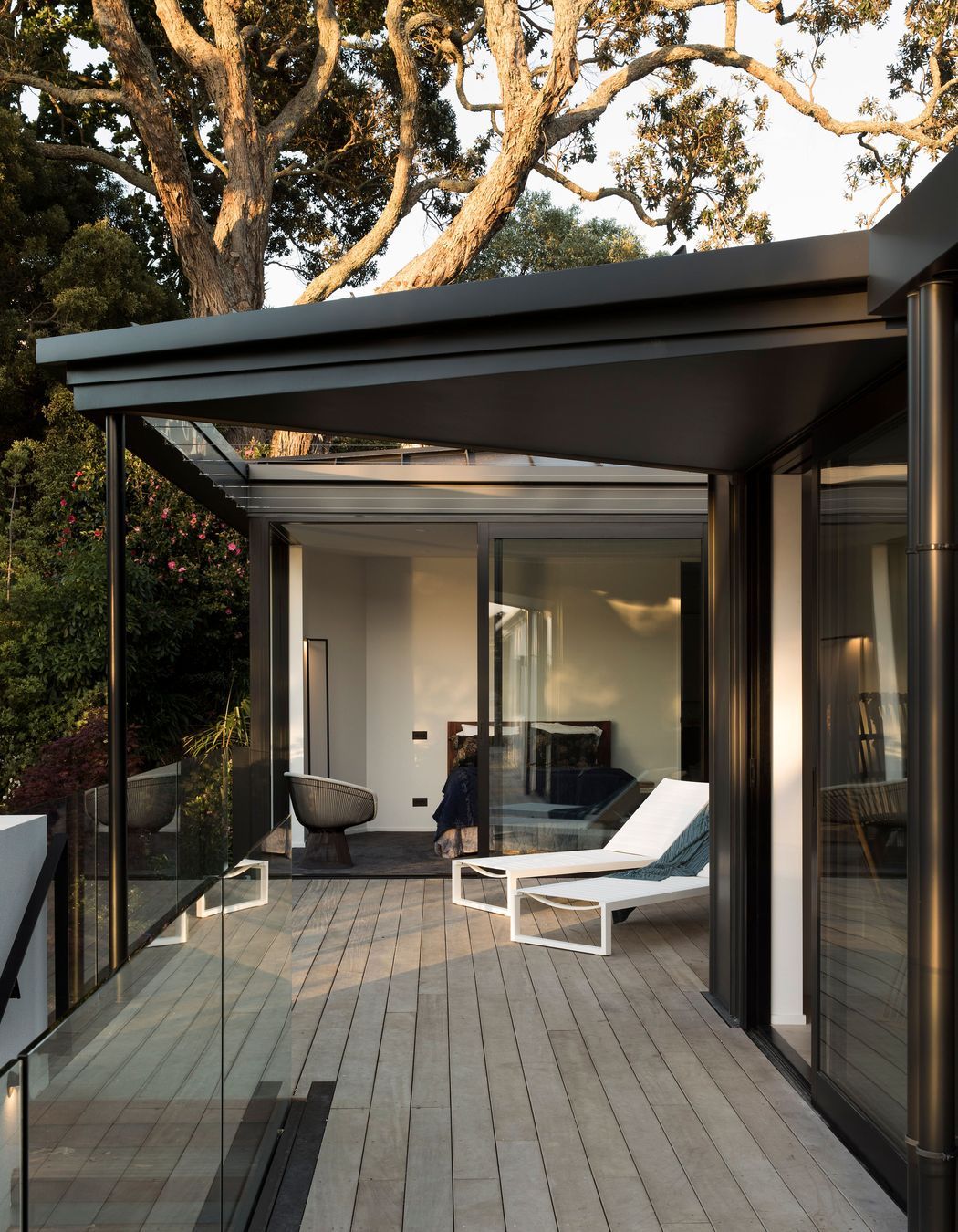 The courtyard off the master bedroom leads down stairs to the left.