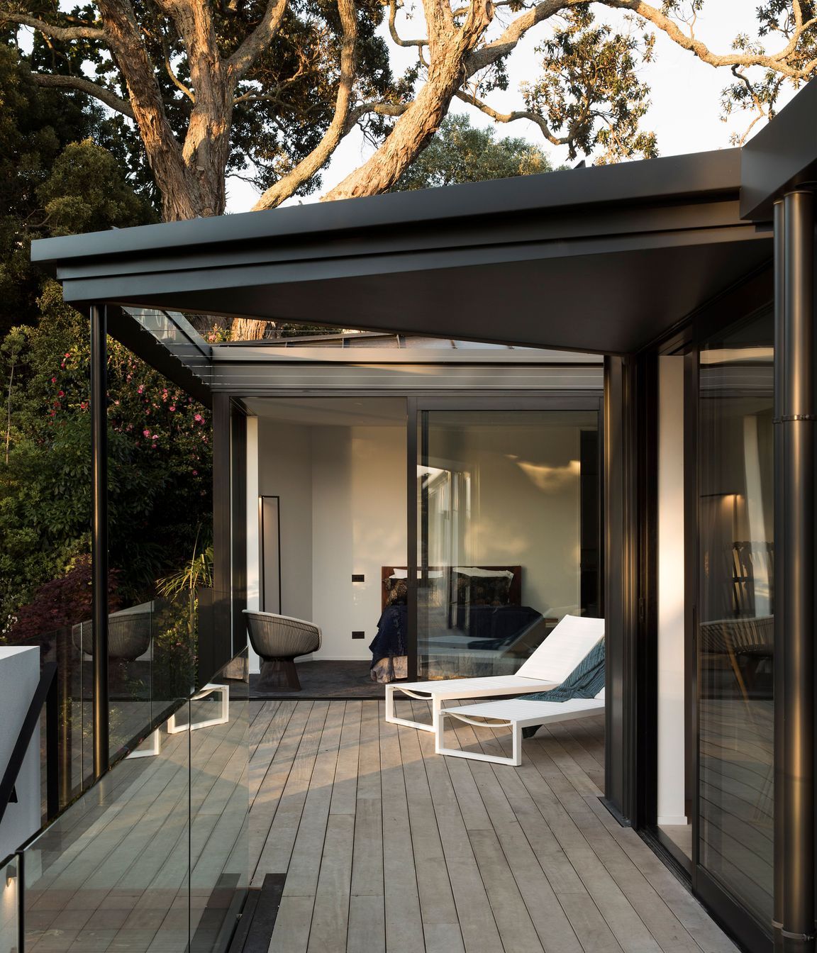 The courtyard off the master bedroom leads down stairs to the left.
