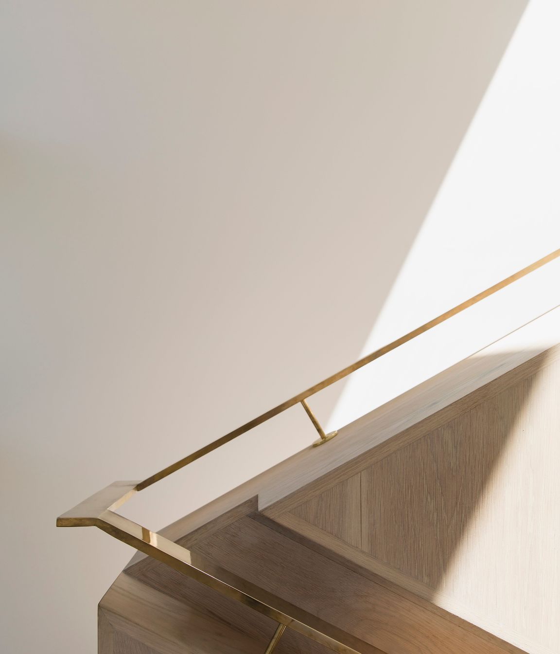  A detail shot of the brass bannister on the timber staircase.