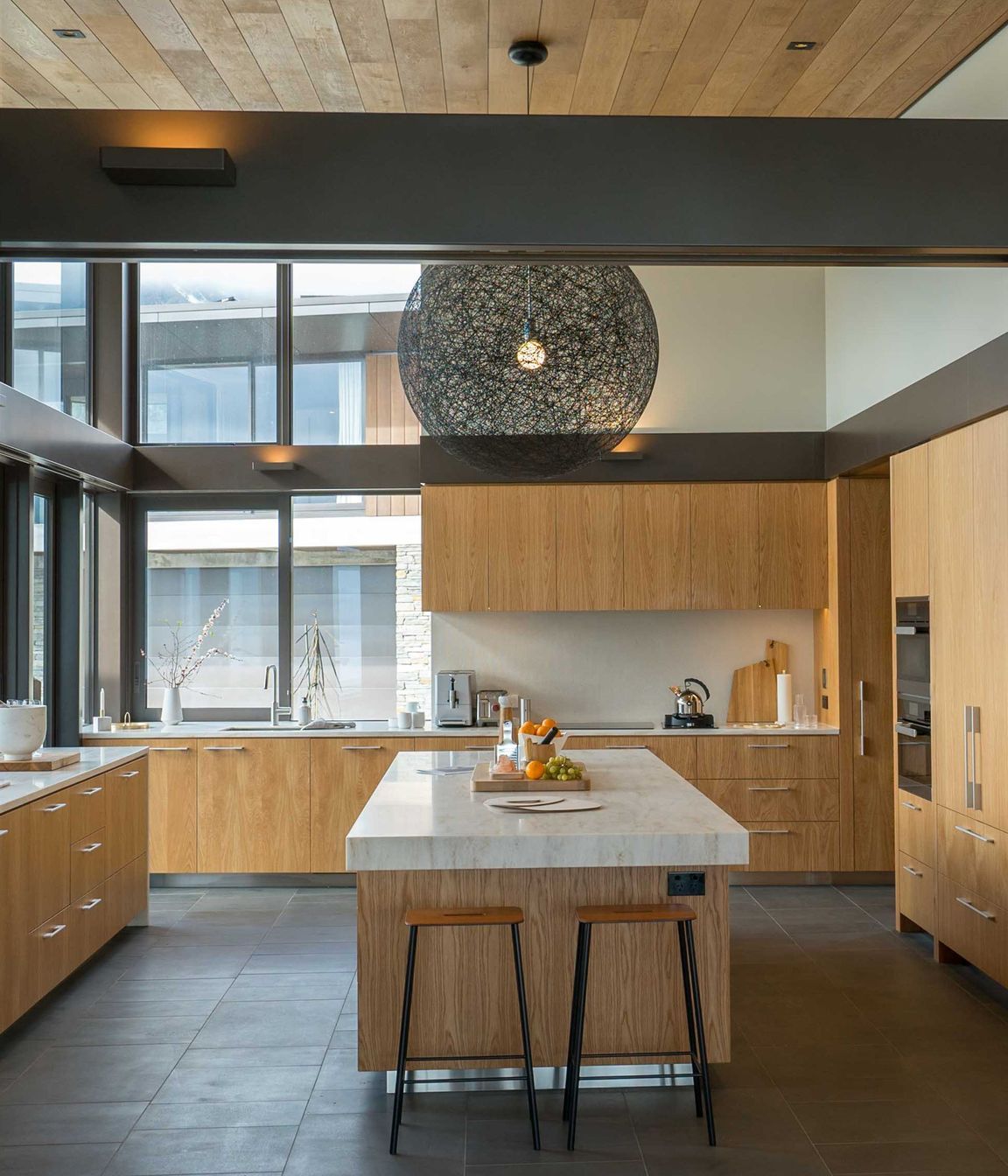 The kitchen overlooks a central courtyard. Photograph: ArchiPro.