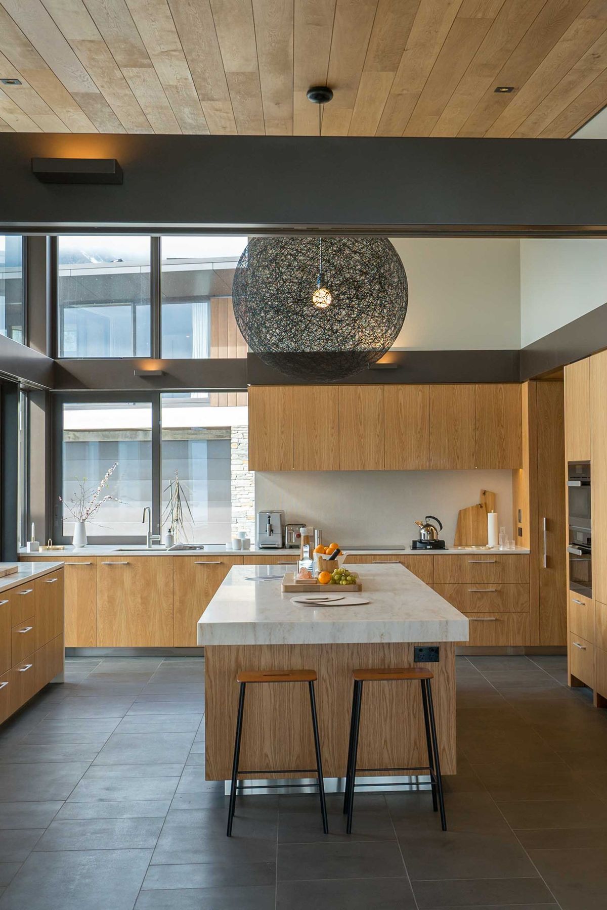 The kitchen overlooks a central courtyard. Photograph: ArchiPro.