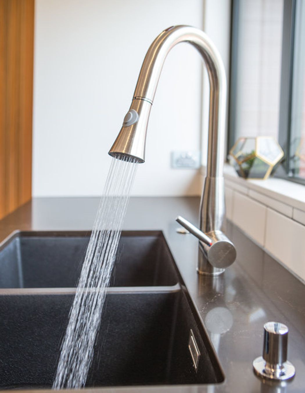 Envirotech auto sensor mixers were used along with gorgeous Blanco Silgranite sinks in anthracite.