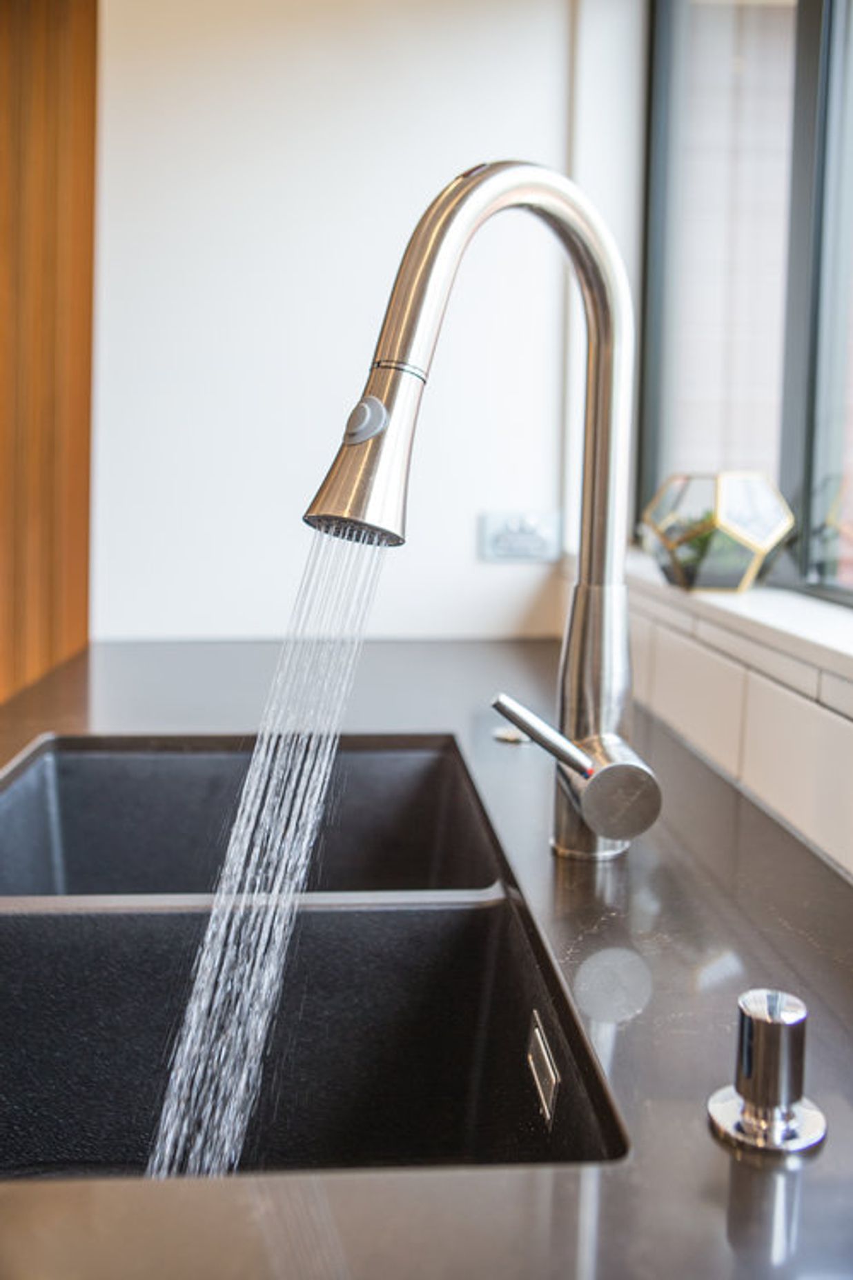 Envirotech auto sensor mixers were used along with gorgeous Blanco Silgranite sinks in anthracite.