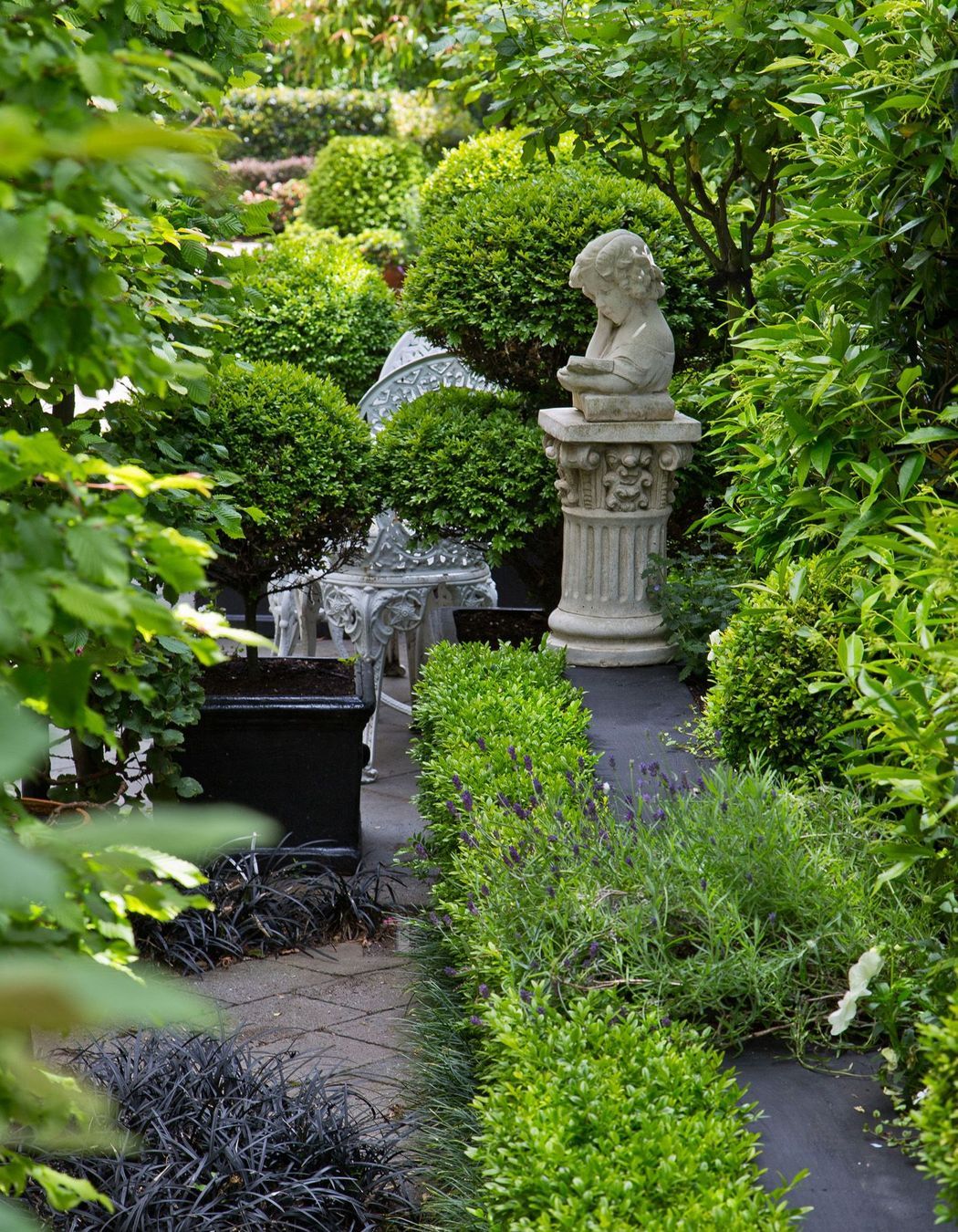 Long narrow garden divided into rooms