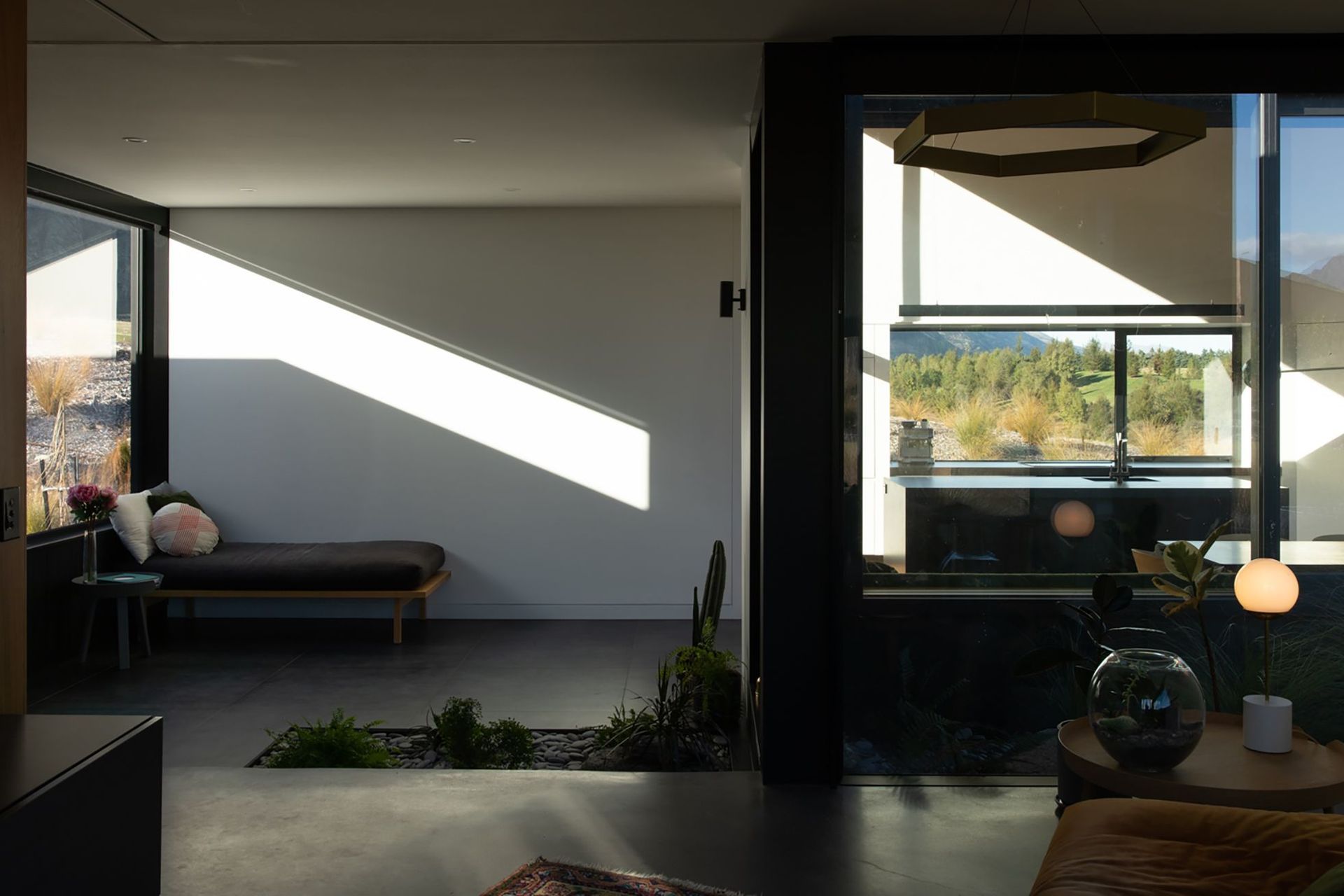 The transition space (left) is affectionately called 'the kumbaya room' by the owners.