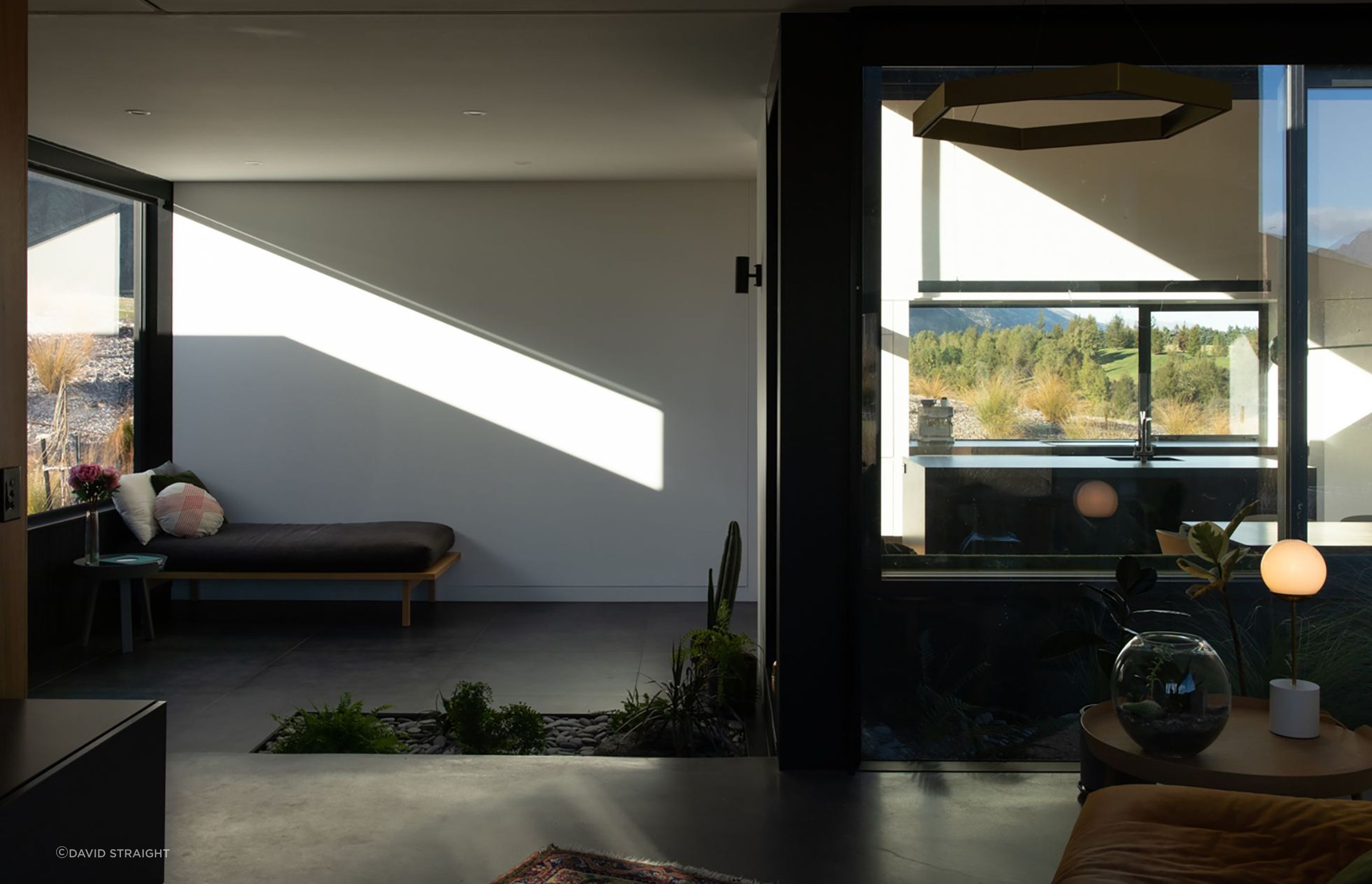 The transition space (left) is affectionately called 'the kumbaya room' by the owners.
