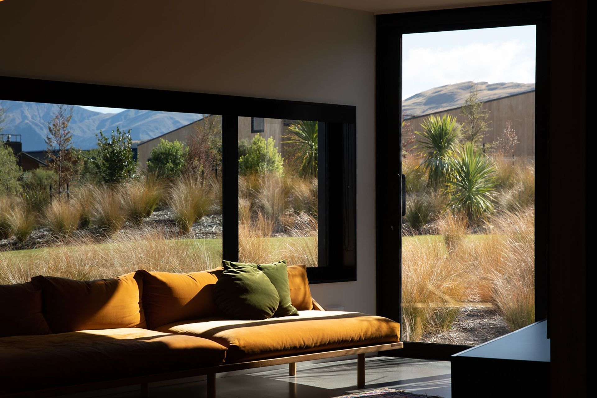 The media lounge offers views into the landscape on three sides.