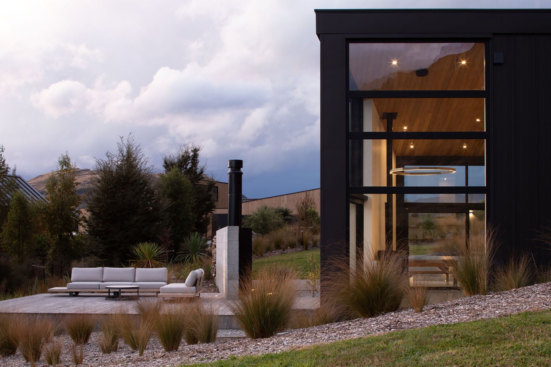 A large terrace provides sheltered outdoor space away from the prevailing winds and will be developed in the future to sit alongside a swimming pool.