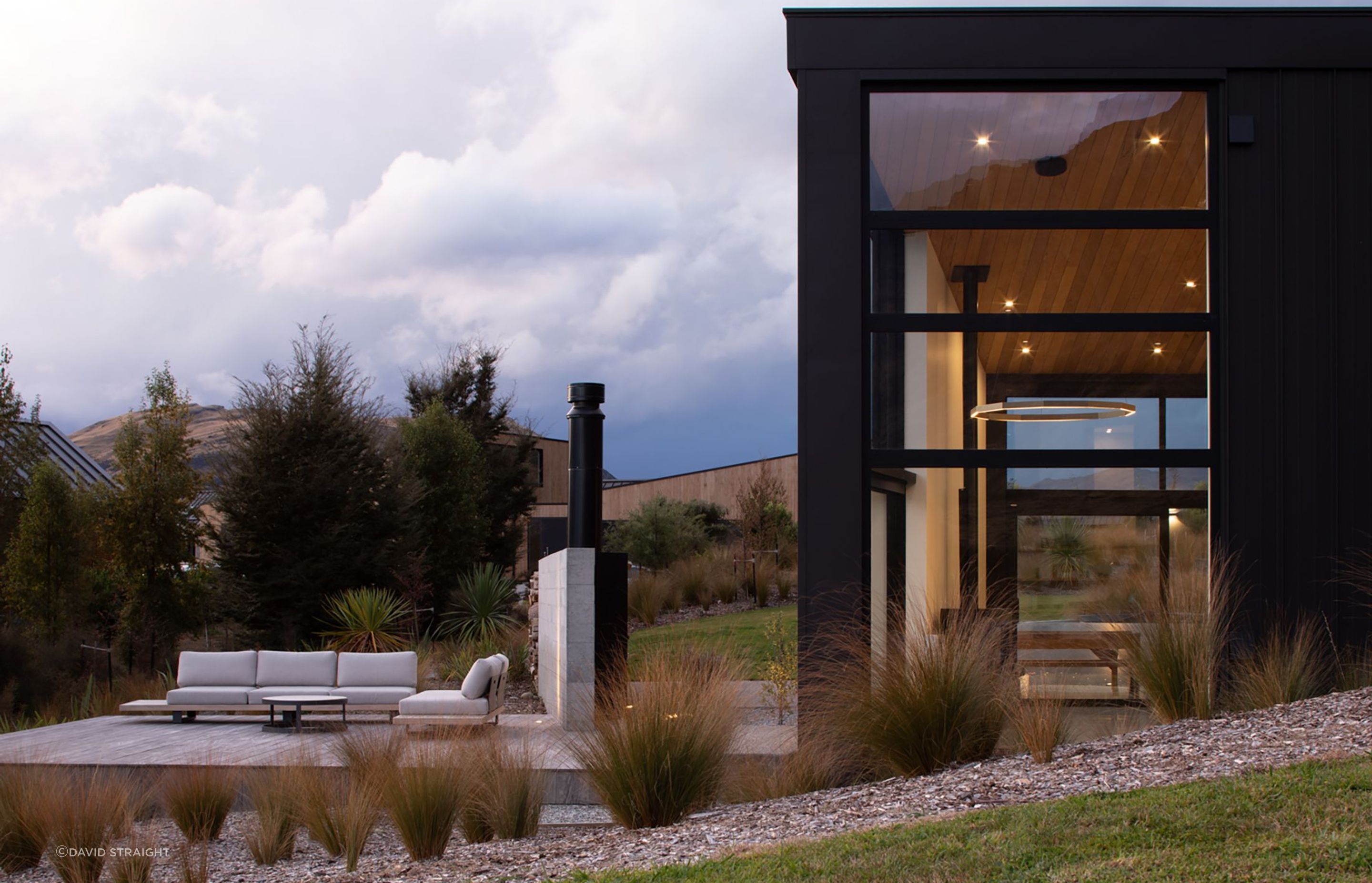 A large terrace provides sheltered outdoor space away from the prevailing winds and will be developed in the future to sit alongside a swimming pool.