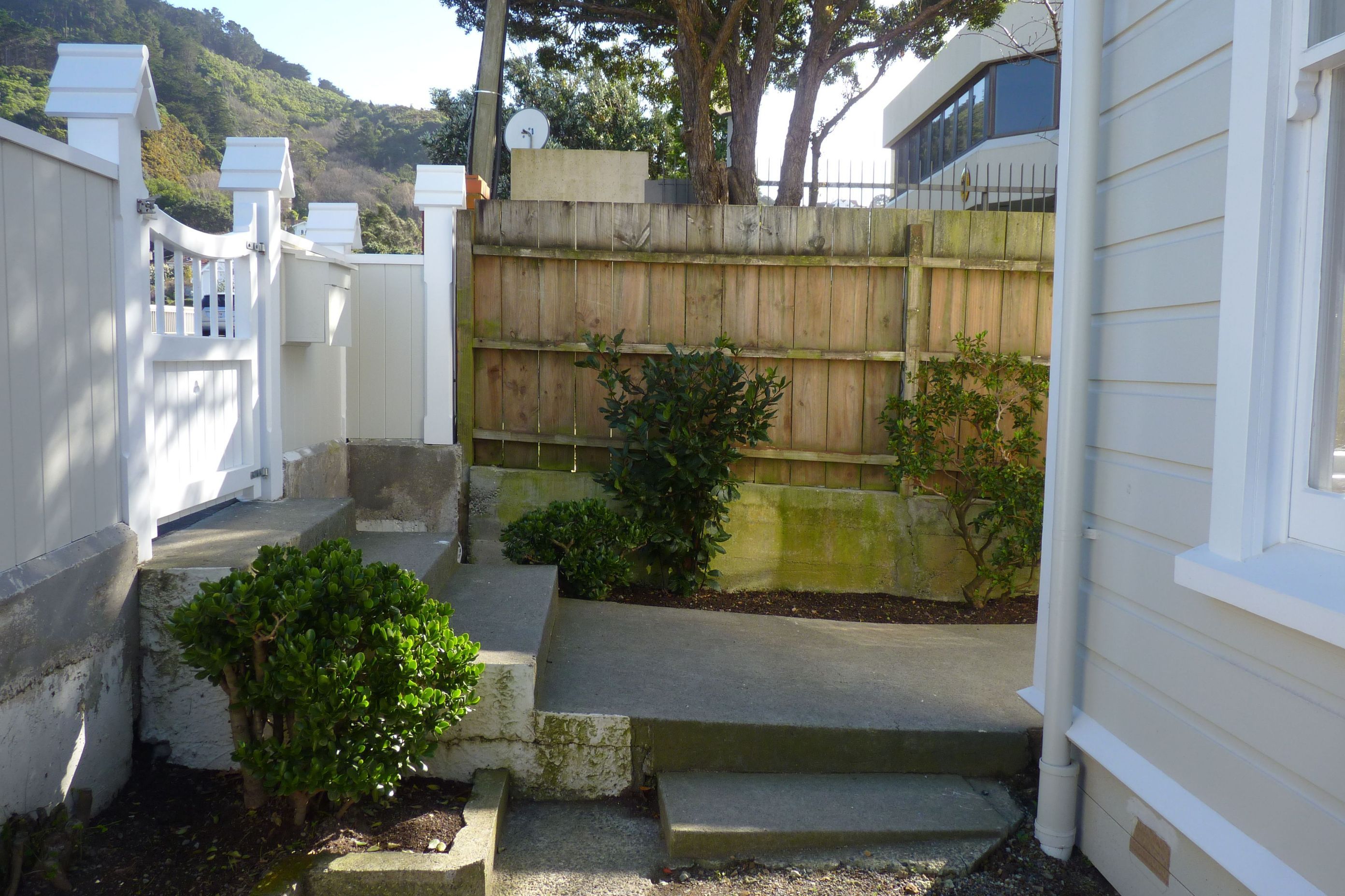 Before - the front entrance. We ended up huilding new concrete foundations to centre the path &amp; steps on front courtyard.