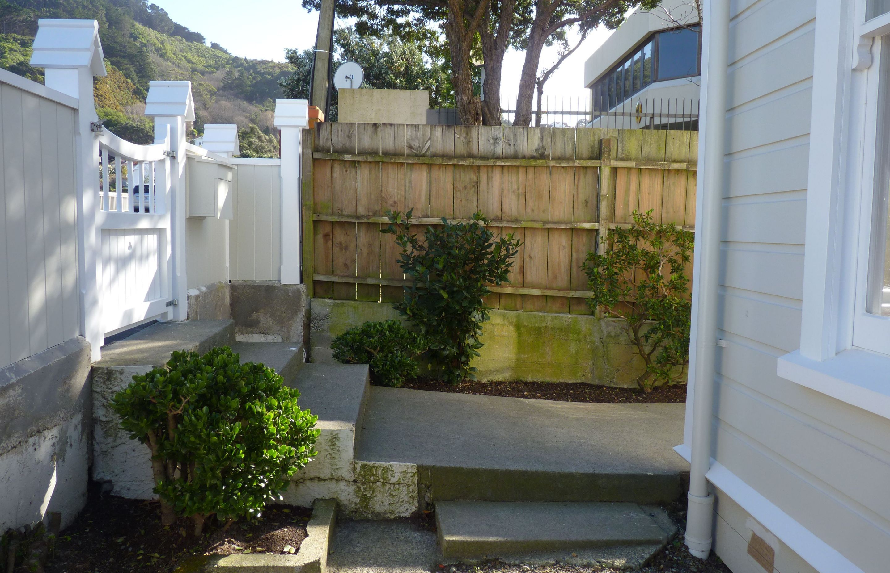 Before - the front entrance. We ended up huilding new concrete foundations to centre the path &amp; steps on front courtyard.