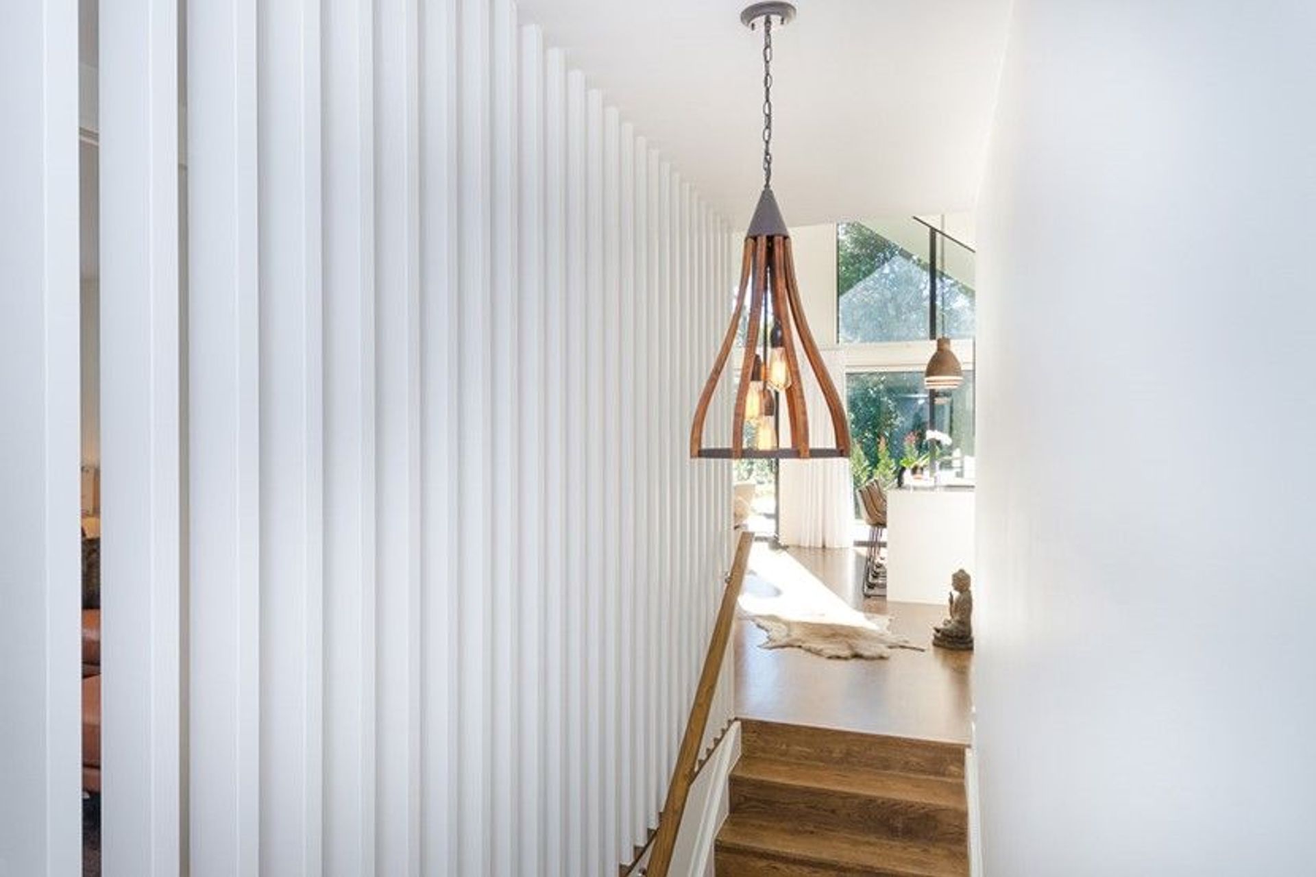 Hobsonville House I - Solid American White Oak Flooring finished w/ Stain in 'Antique Brown' and waterborne polyurethane