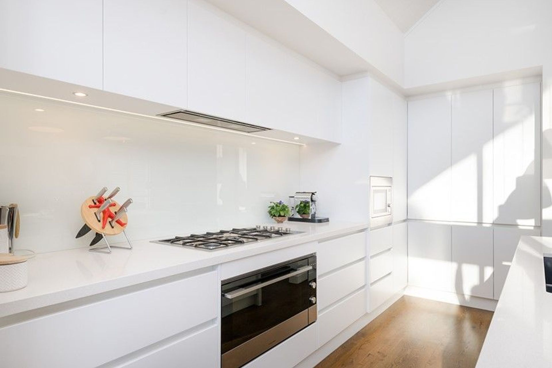 Hobsonville House I - Solid American White Oak Flooring finished w/ Stain in 'Antique Brown' and waterborne polyurethane