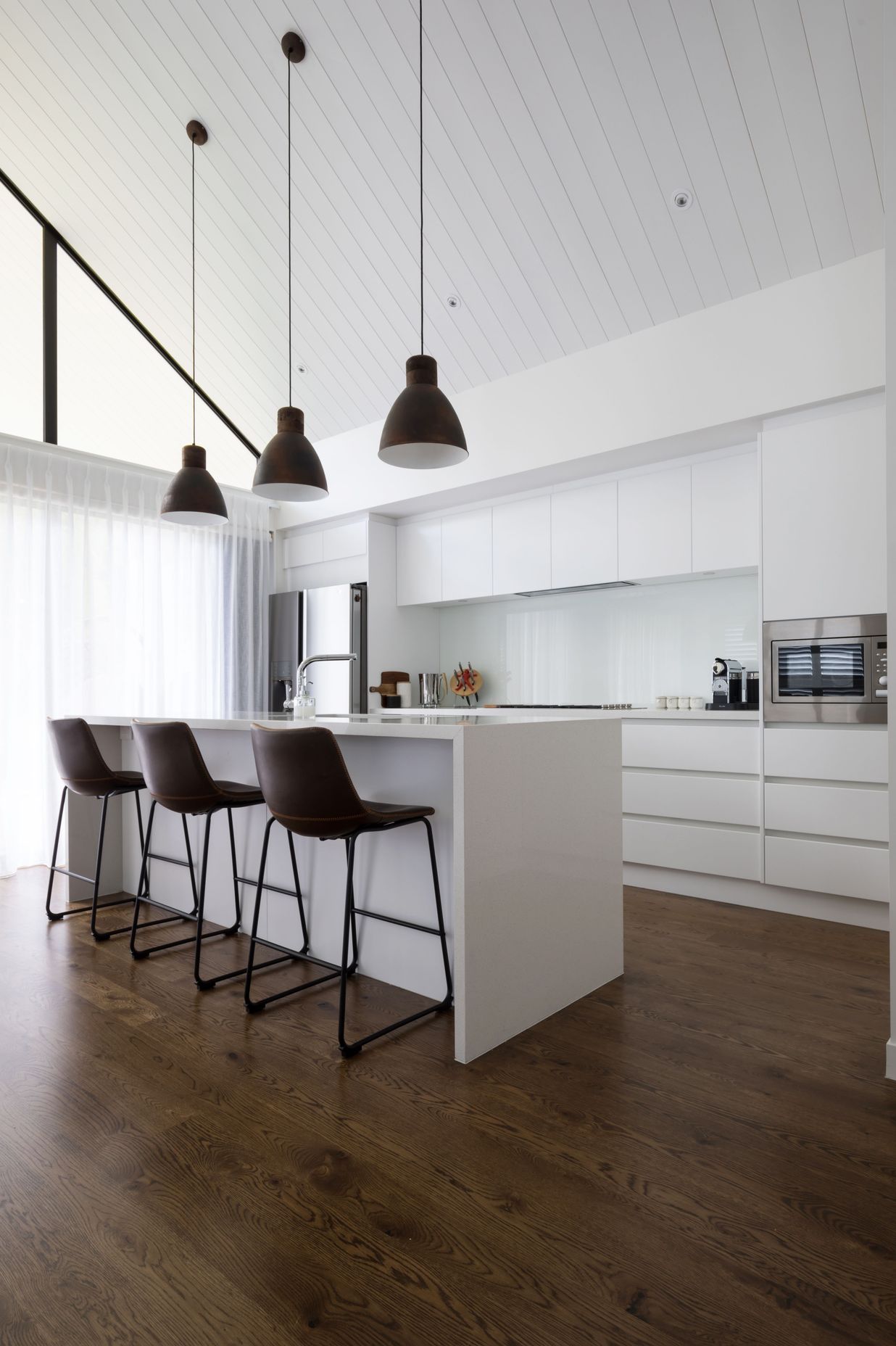 Hobsonville House I - Solid American White Oak Flooring finished w/ Stain in 'Antique Brown' and waterborne polyurethane