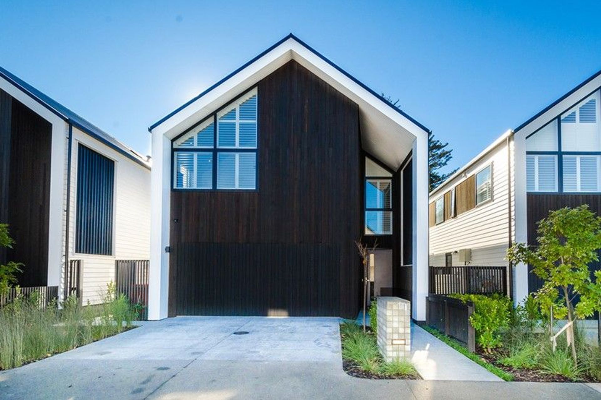 Hobsonville House I - Solid American White Oak Flooring finished w/ Stain in 'Antique Brown' and waterborne polyurethane