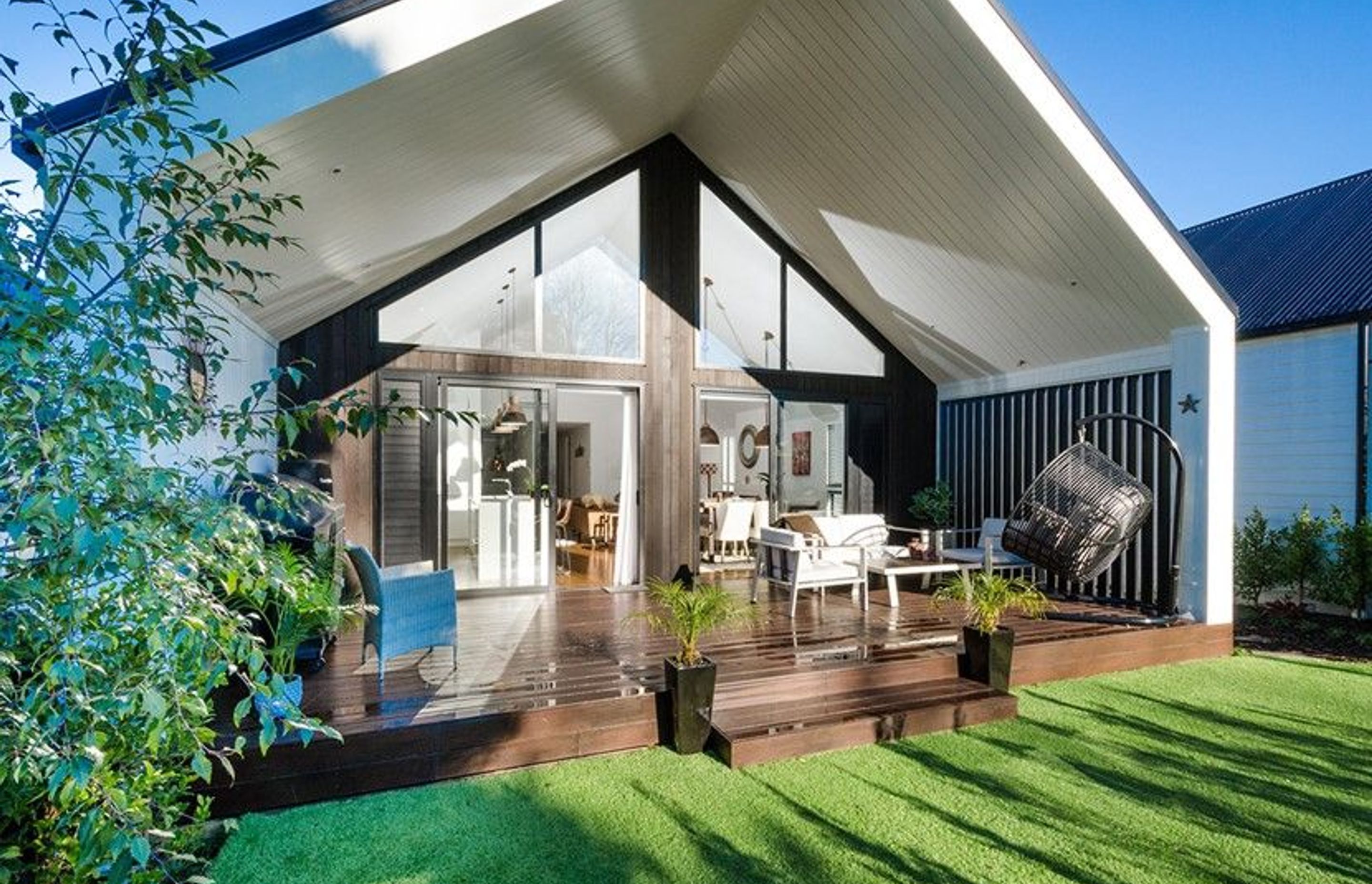 Hobsonville House I - Solid American White Oak Flooring finished w/ Stain in 'Antique Brown' and waterborne polyurethane