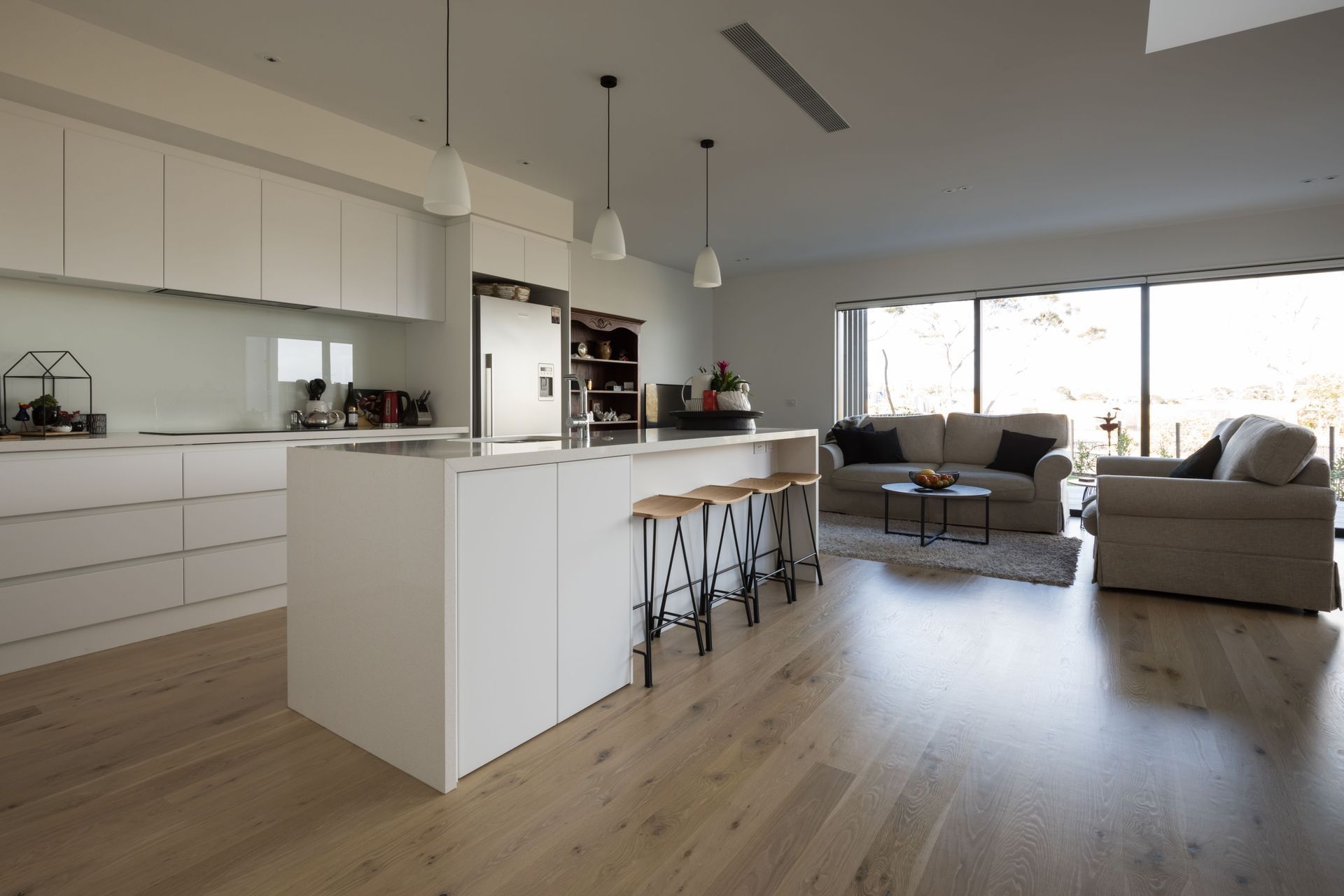 Hobsonville IV - Rustic Grade Solid American White Oak Flooring finished w/ Clear Waterborne Polyurethane.
