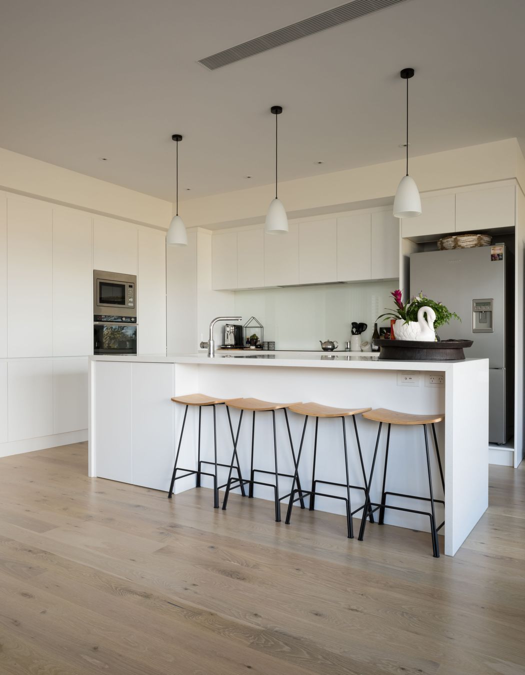 Hobsonville IV - Rustic Grade Solid American White Oak Flooring finished w/ Clear Waterborne Polyurethane.