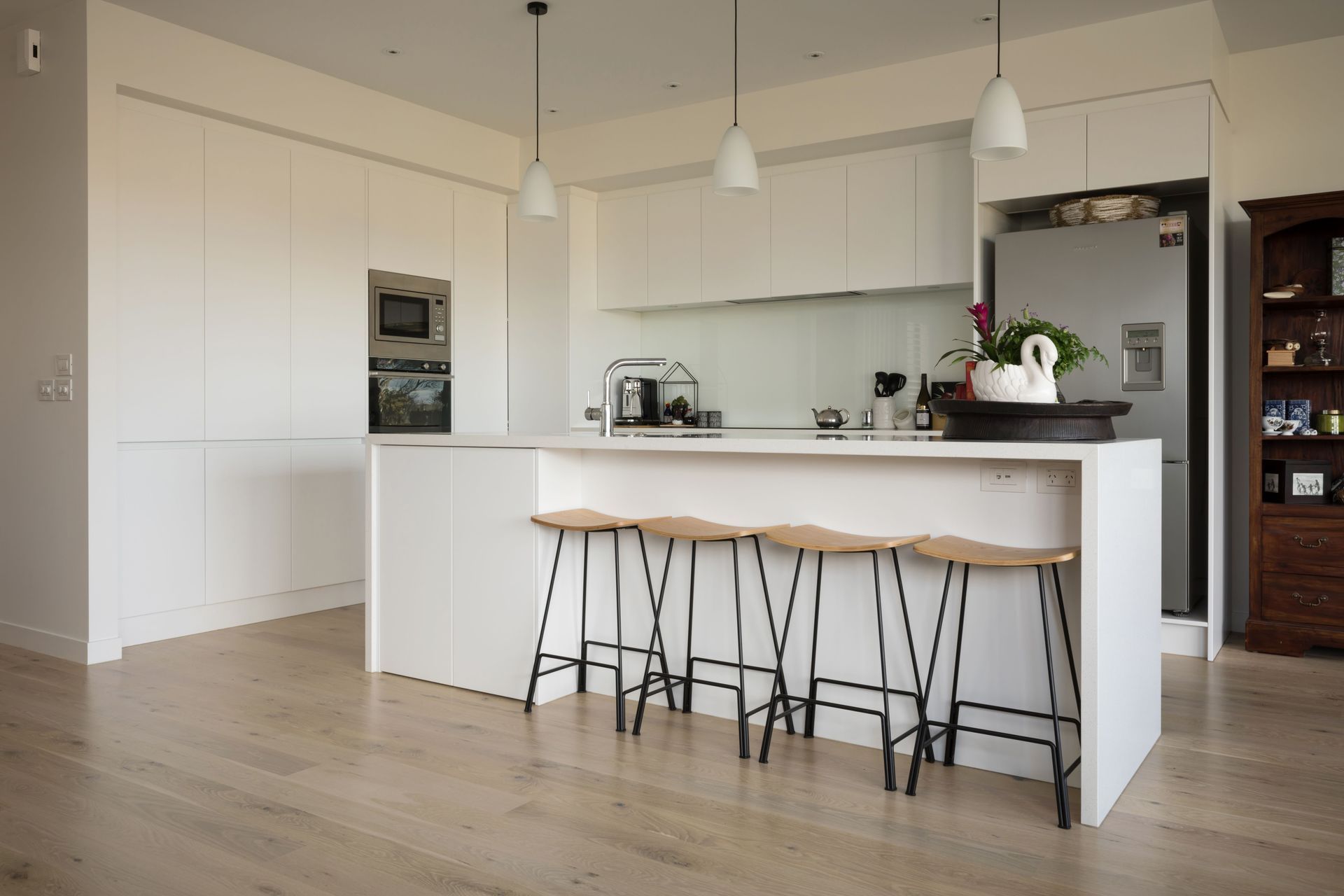 Hobsonville IV - Rustic Grade Solid American White Oak Flooring finished w/ Clear Waterborne Polyurethane.