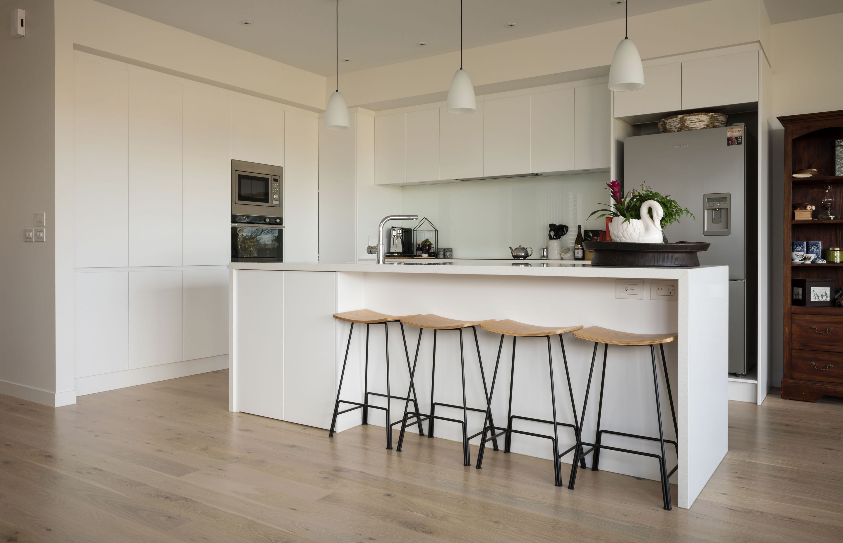 Hobsonville IV - Rustic Grade Solid American White Oak Flooring finished w/ Clear Waterborne Polyurethane.