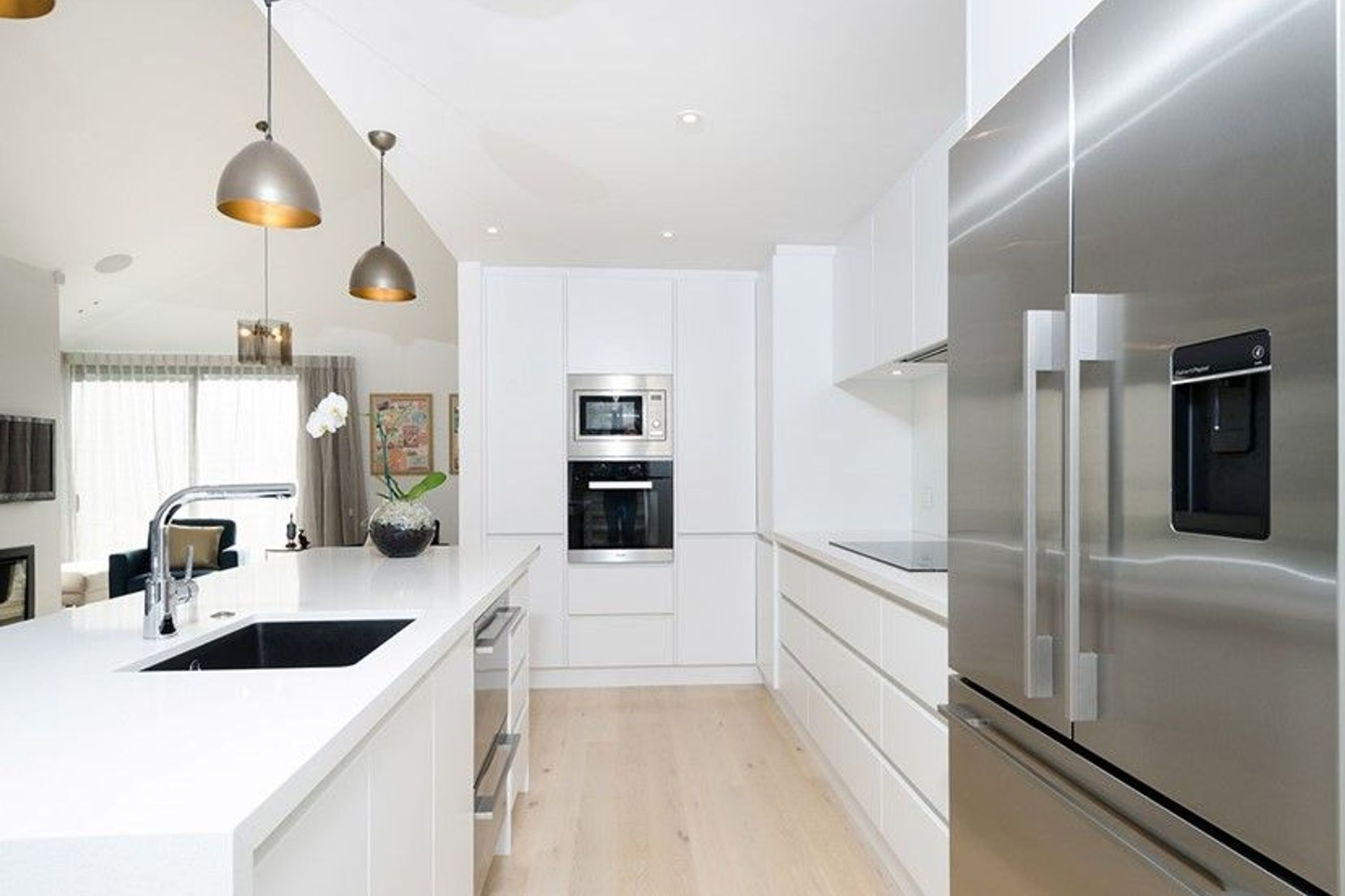 Hobsonville Pt Home - Solid American White Oak flooring finished w/ Bona Stain in 'White' + Waterborne Polyurethane