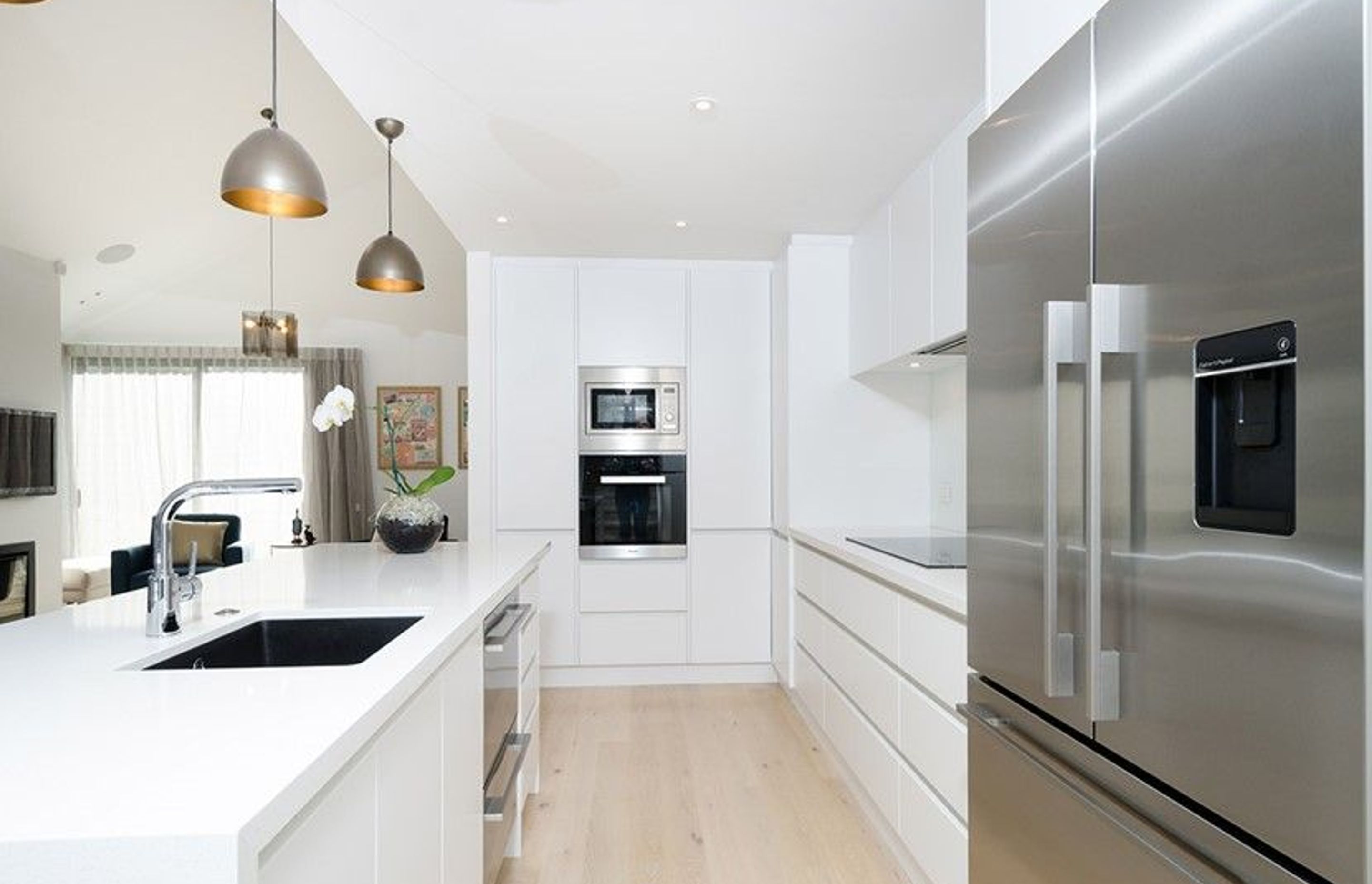 Hobsonville Pt Home - Solid American White Oak flooring finished w/ Bona Stain in 'White' + Waterborne Polyurethane