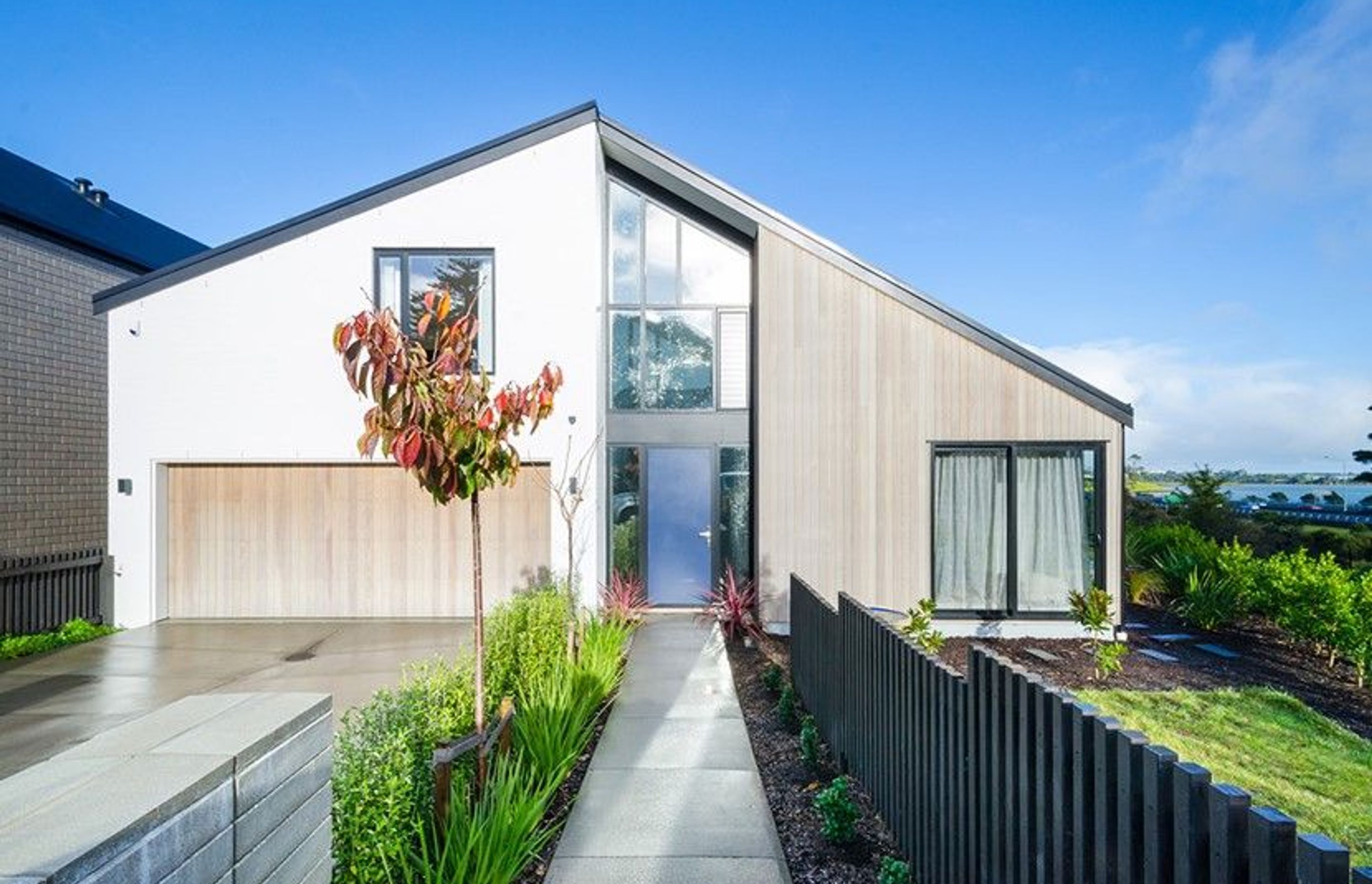 Hobsonville Pt Home - Solid American White Oak flooring finished w/ Bona Stain in 'White' + Waterborne Polyurethane