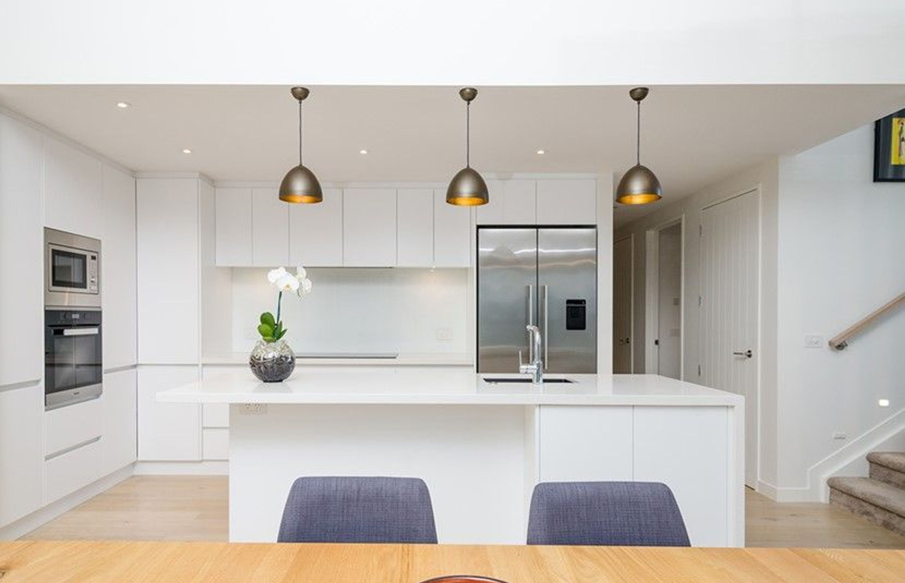 Hobsonville Pt Home - Solid American White Oak flooring finished w/ Bona Stain in 'White' + Waterborne Polyurethane