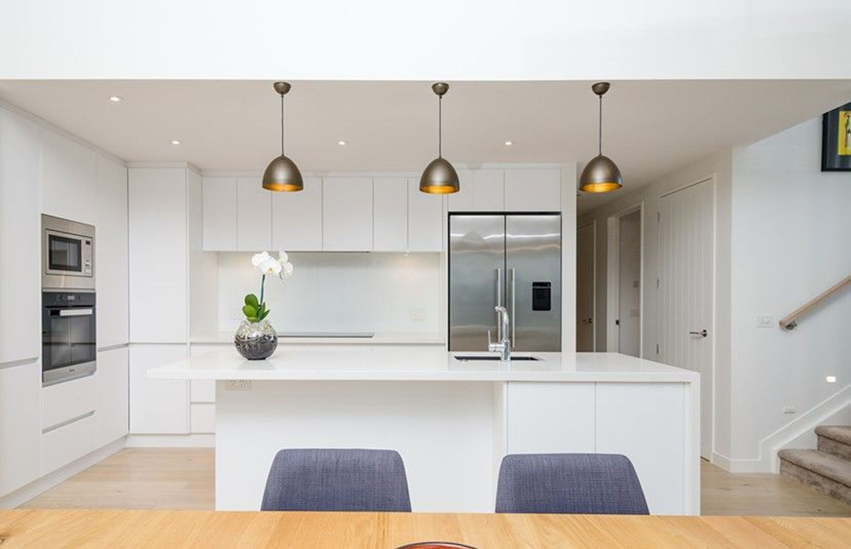 Hobsonville Pt Home - Solid American White Oak flooring finished w/ Bona Stain in 'White' + Waterborne Polyurethane