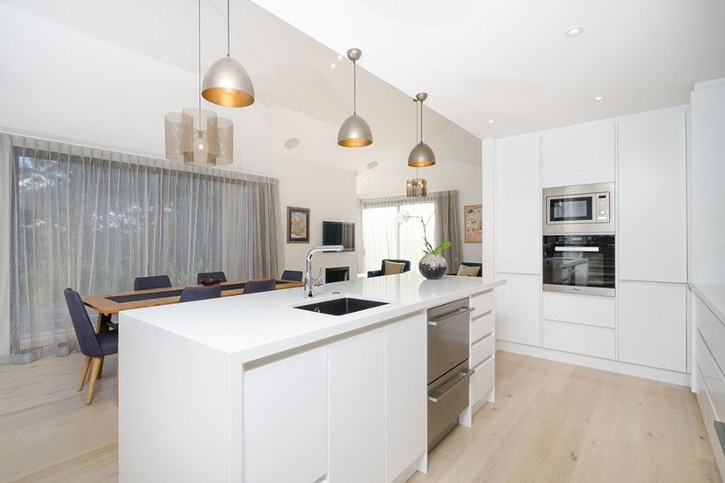 Hobsonville Pt Home - Solid American White Oak flooring finished w/ Bona Stain in 'White' + Waterborne Polyurethane