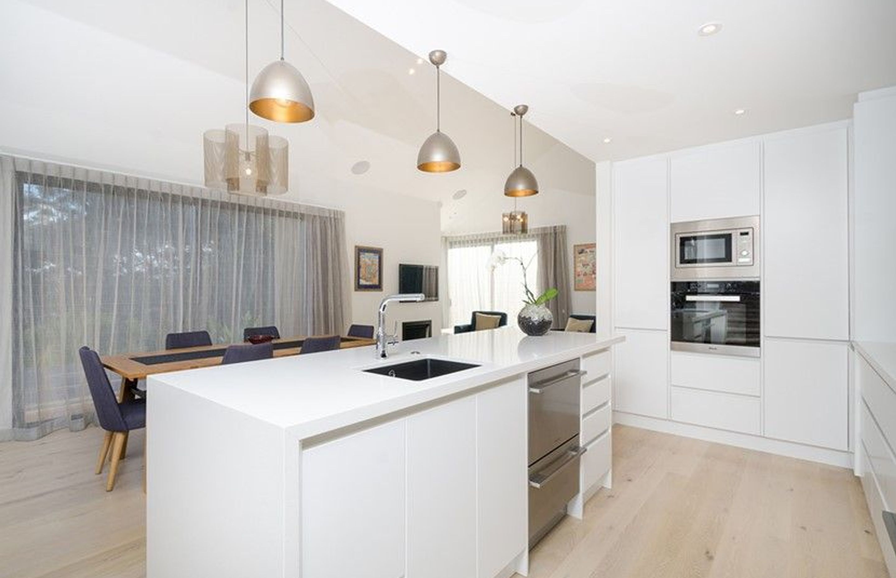 Hobsonville Pt Home - Solid American White Oak flooring finished w/ Bona Stain in 'White' + Waterborne Polyurethane