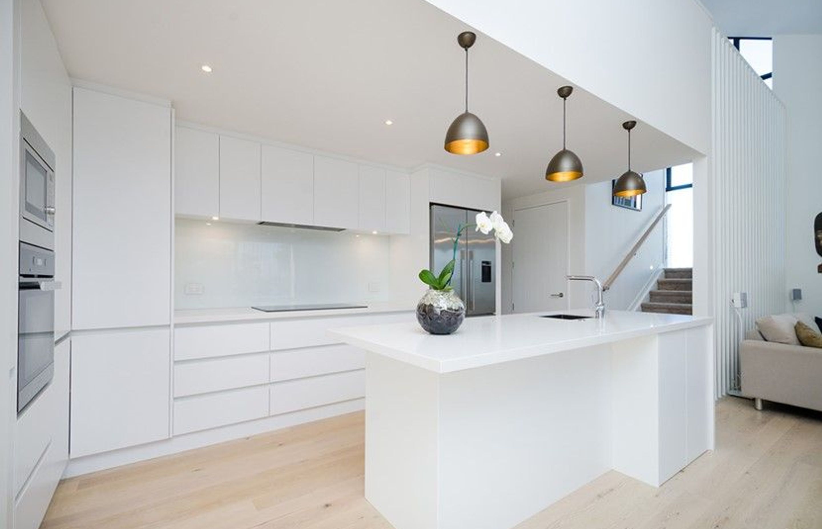 Hobsonville Pt Home - Solid American White Oak flooring finished w/ Bona Stain in 'White' + Waterborne Polyurethane