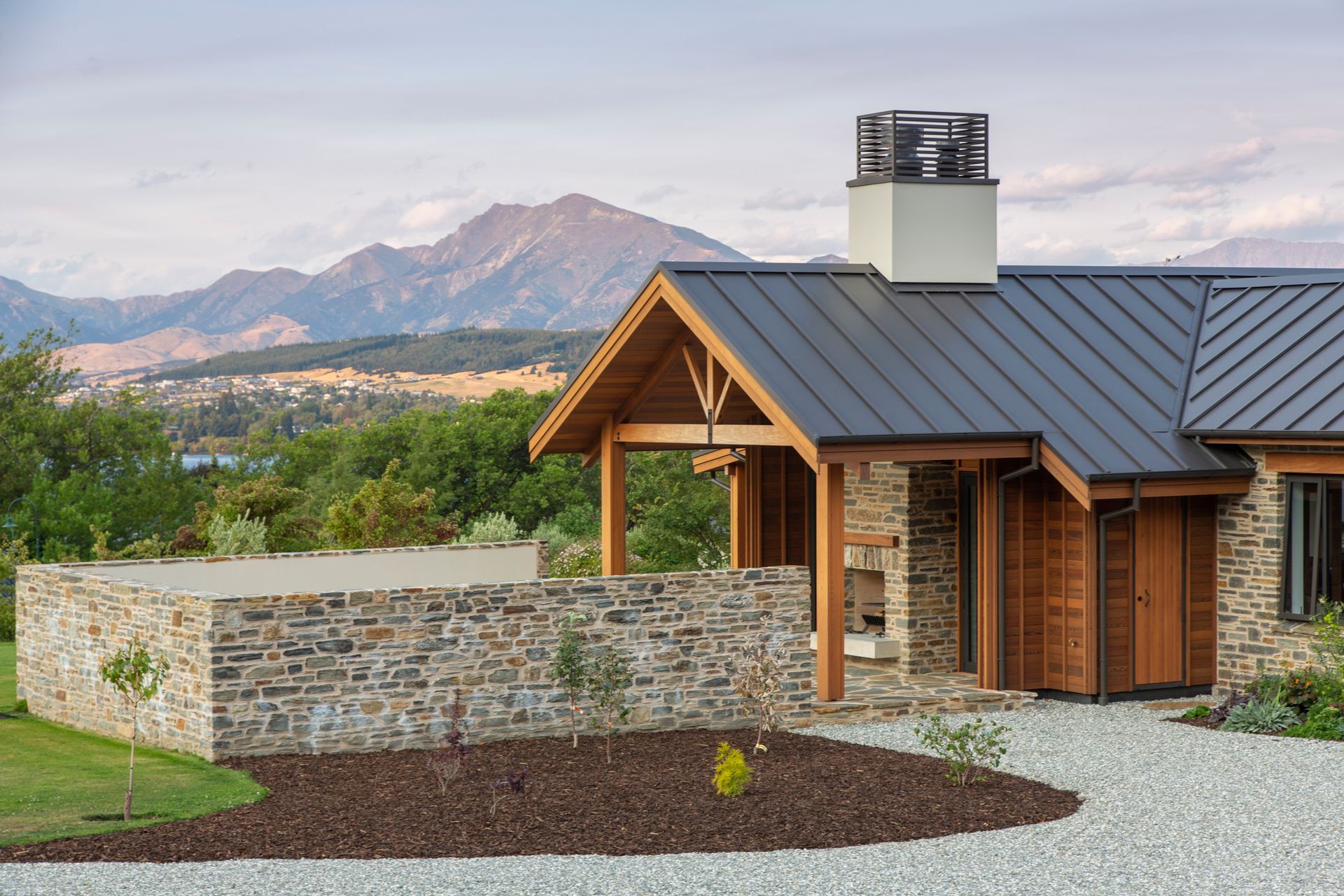 A walled courtyard with open fireplace is another of the outdoor areas.