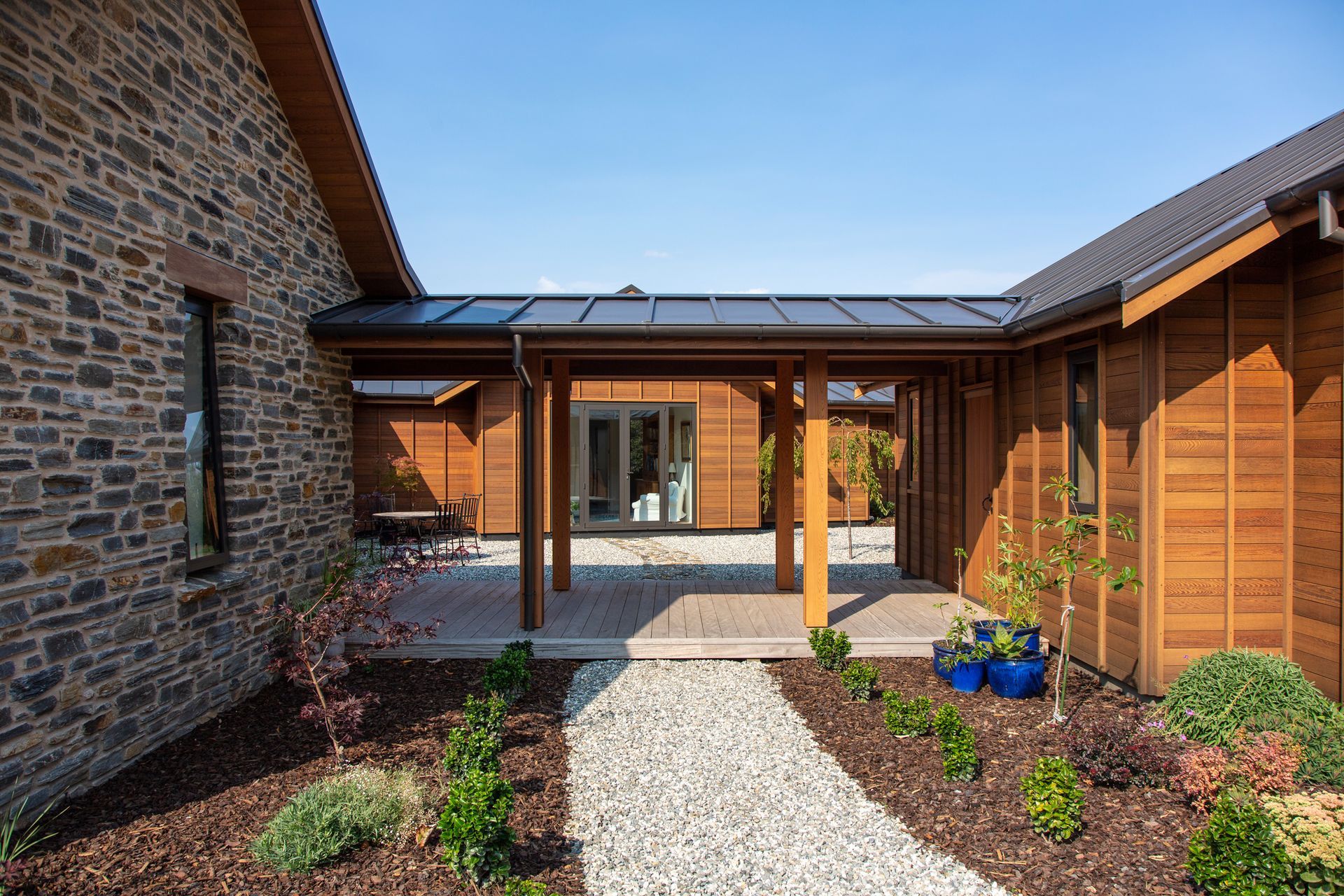 The design allows for multiple outdoor areas, including an internal courtyard offering sheltered outdoor entertaining.