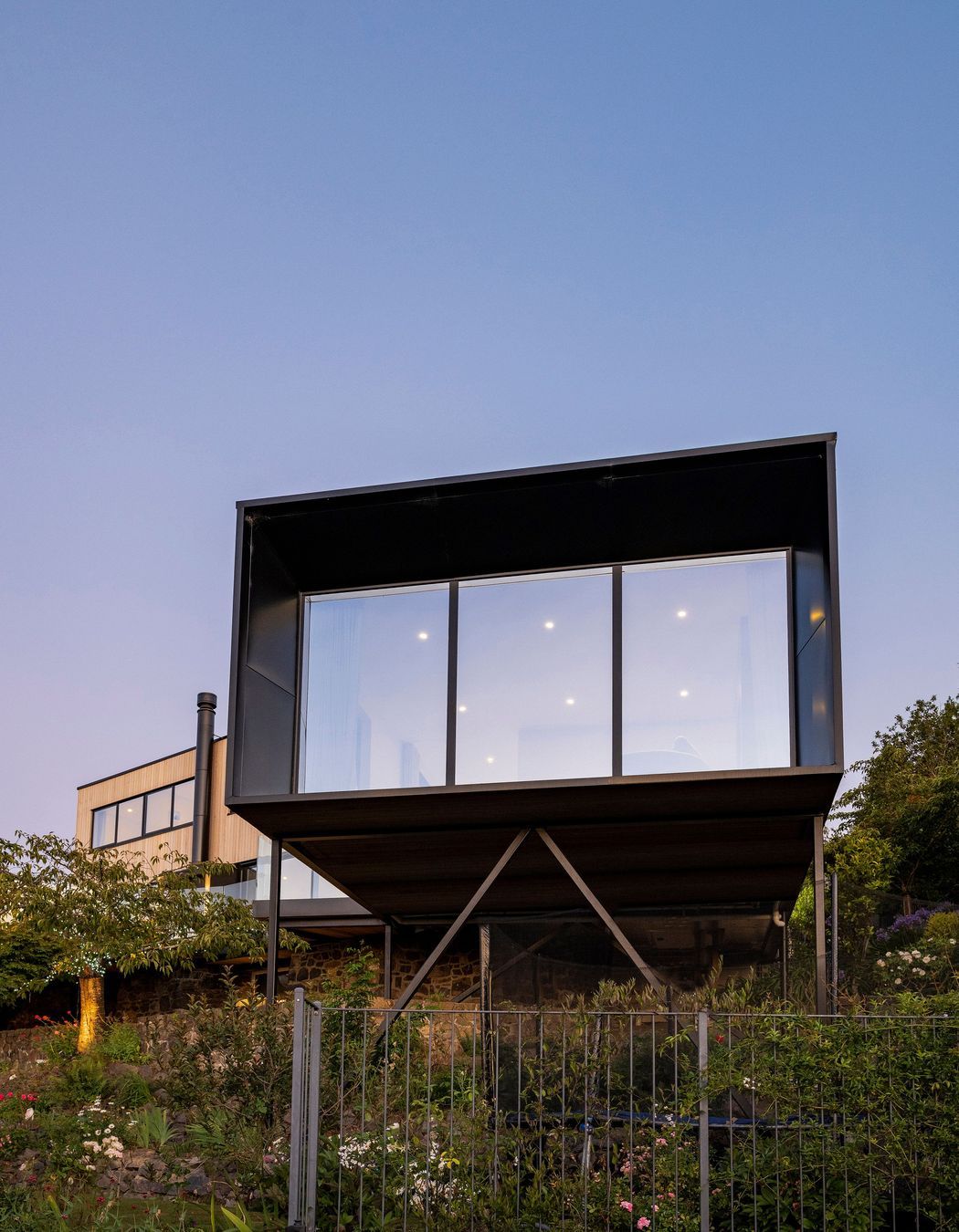 A huge viewing window has chamfered edges that enlarge the outward perspective.