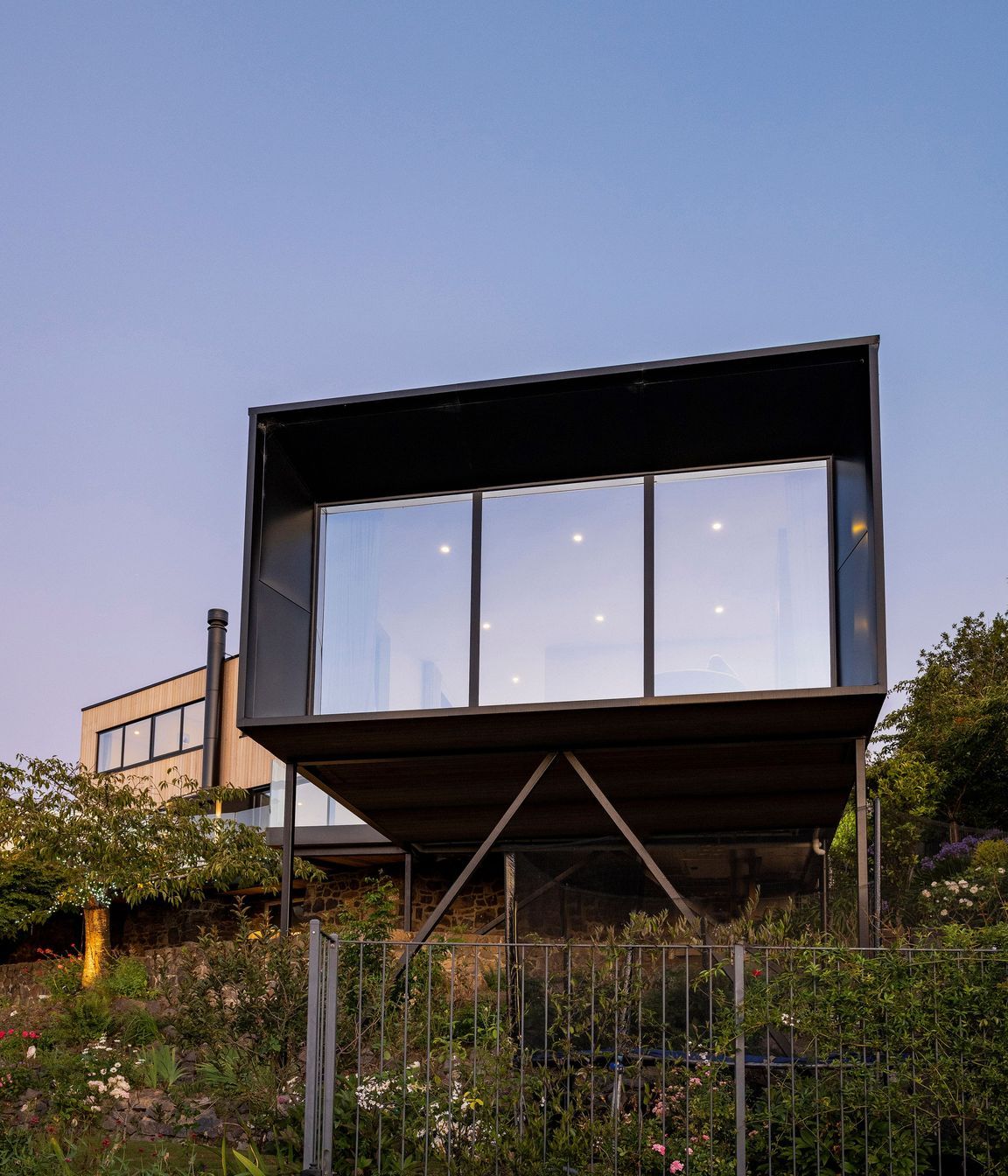 A huge viewing window has chamfered edges that enlarge the outward perspective.