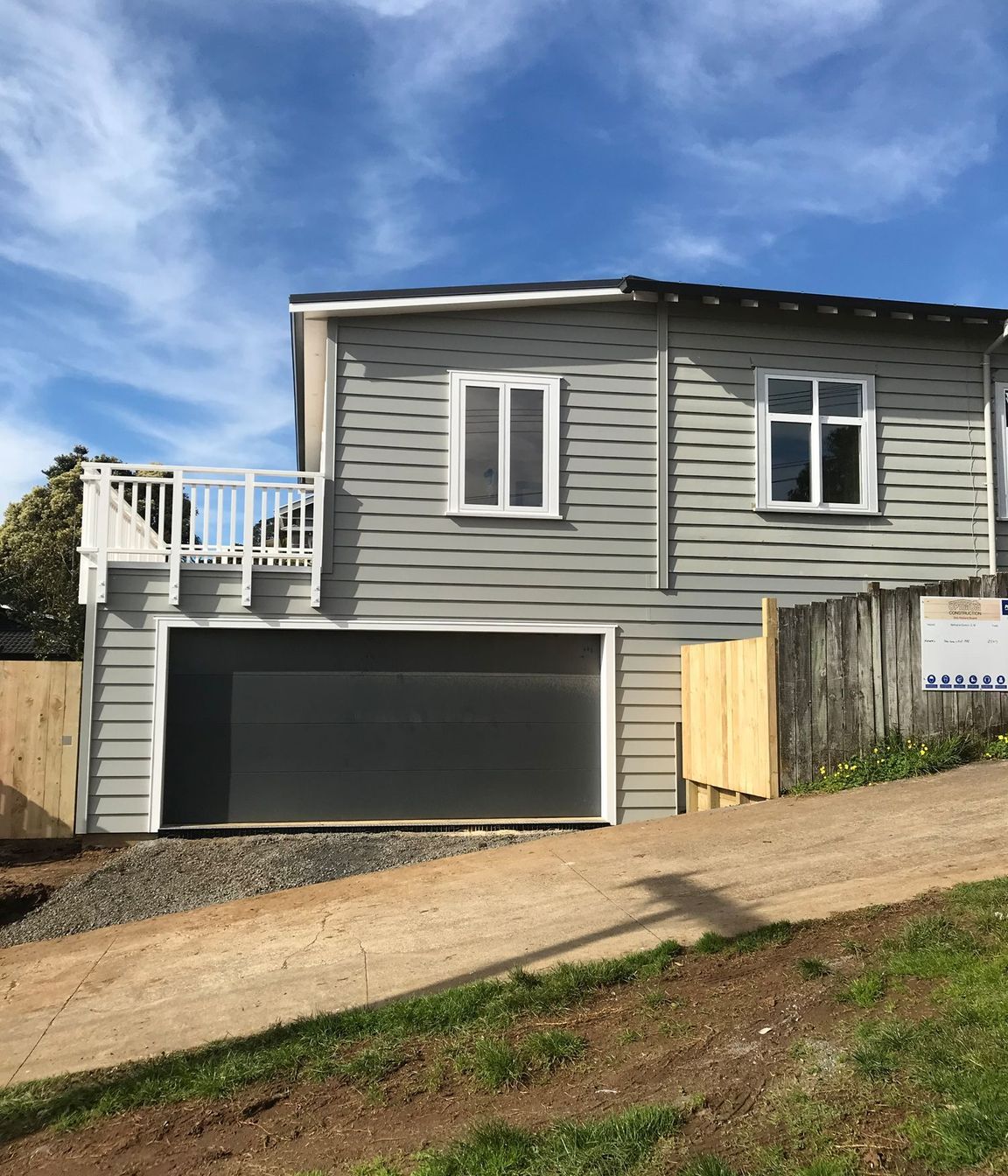 Added double garage, laundry, and storage room underneath the house.<br />Also added an internal stairwell.