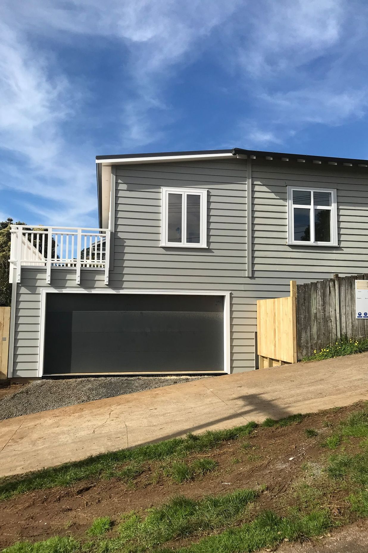 Added double garage, laundry, and storage room underneath the house.<br />Also added an internal stairwell.