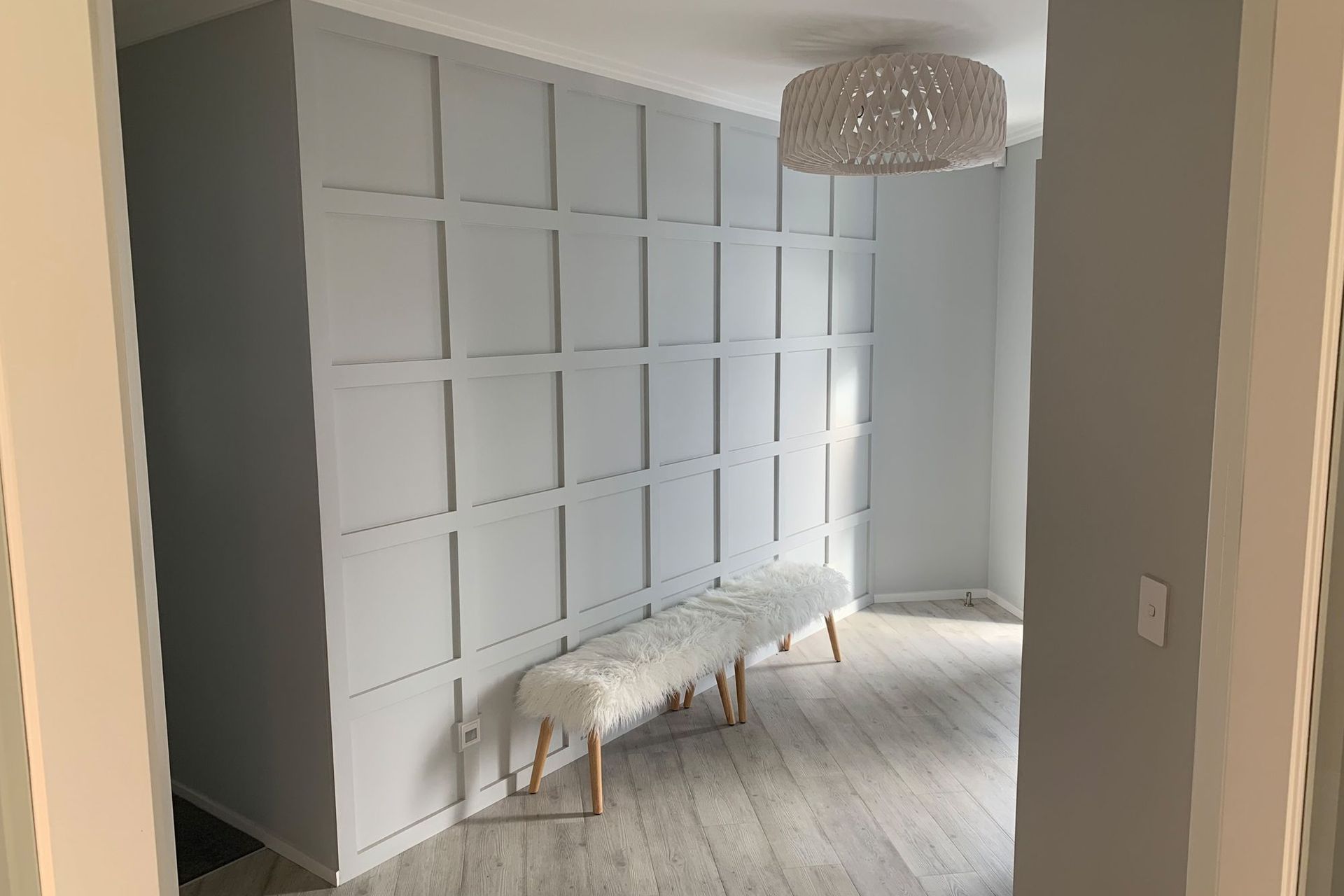 Feature wall to front door entrance.