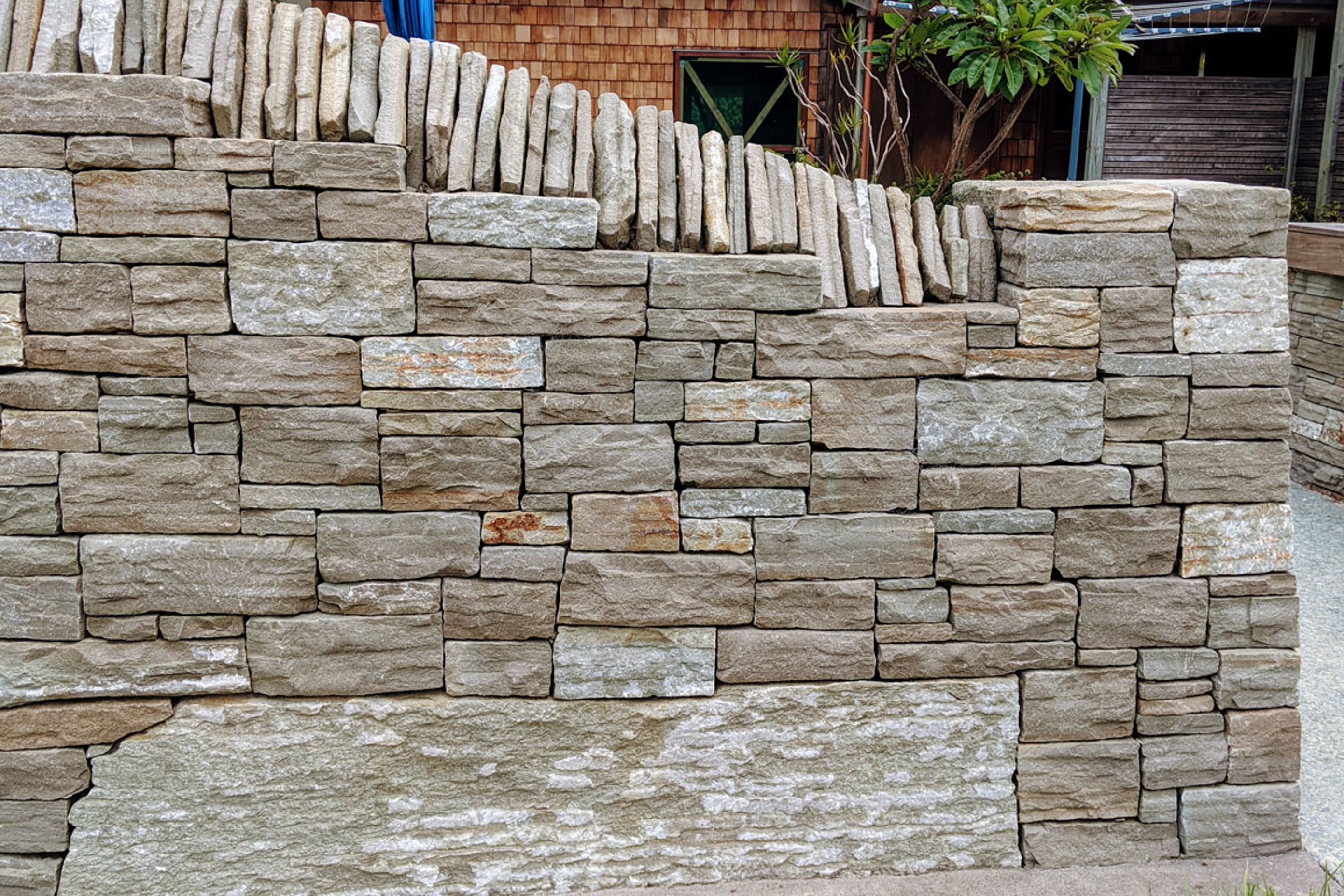 Wall with feature rock
