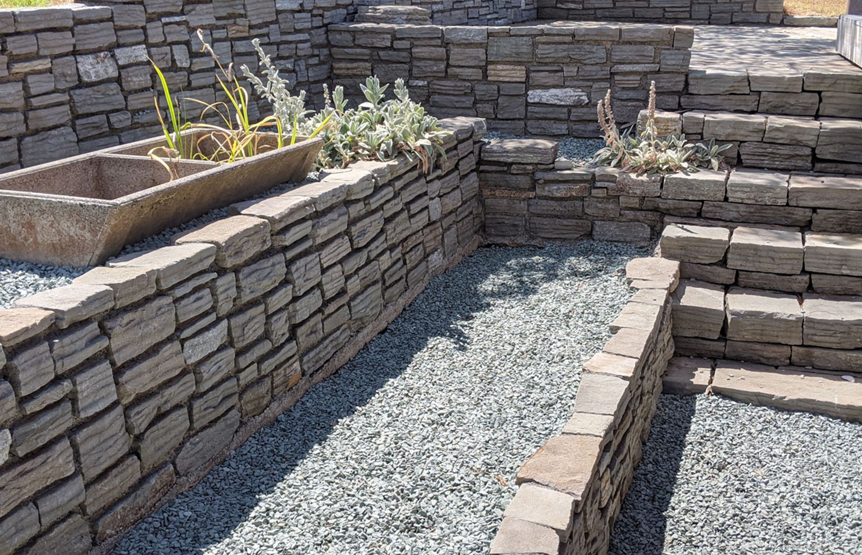 Stepped retaining walls