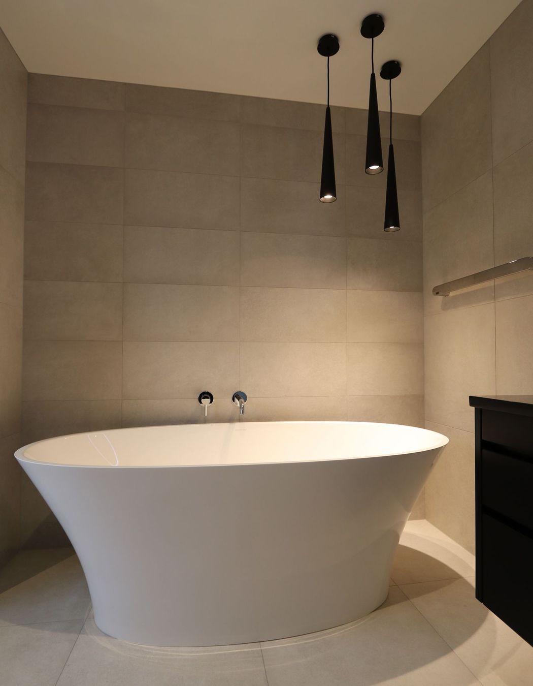 The stunning feature bath takes the cake in this award-winning bathroom.