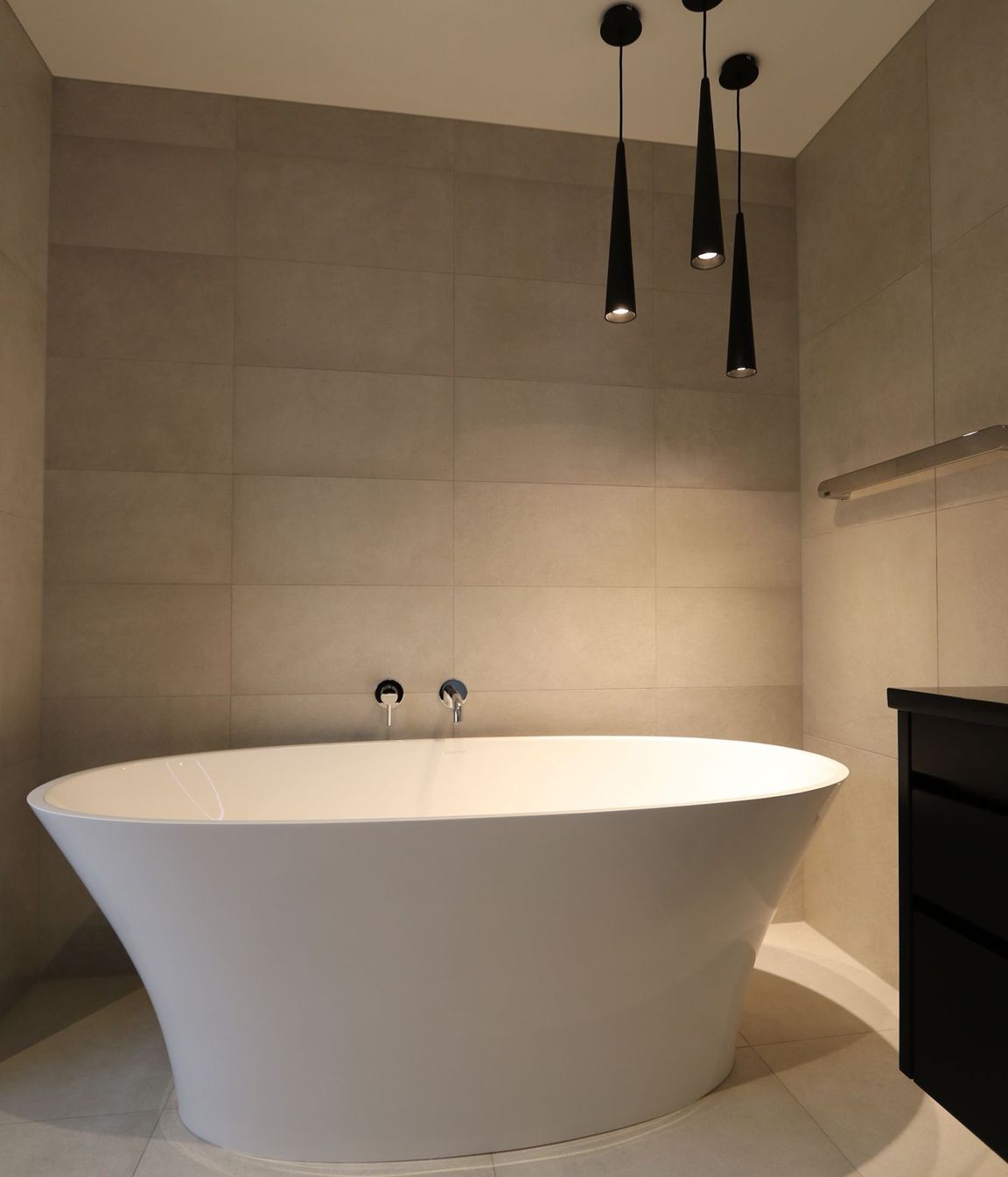 The stunning feature bath takes the cake in this award-winning bathroom.
