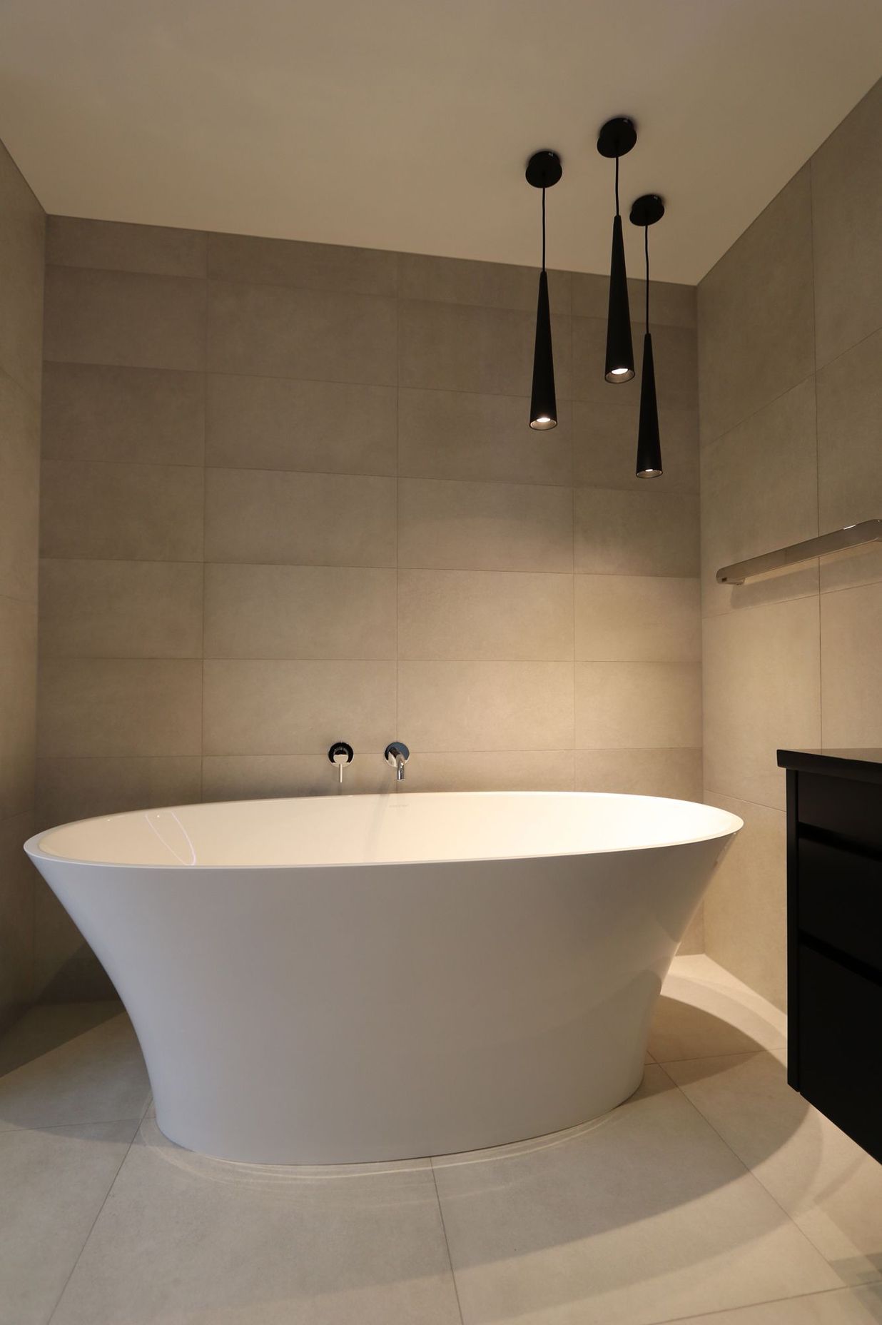 The stunning feature bath takes the cake in this award-winning bathroom.